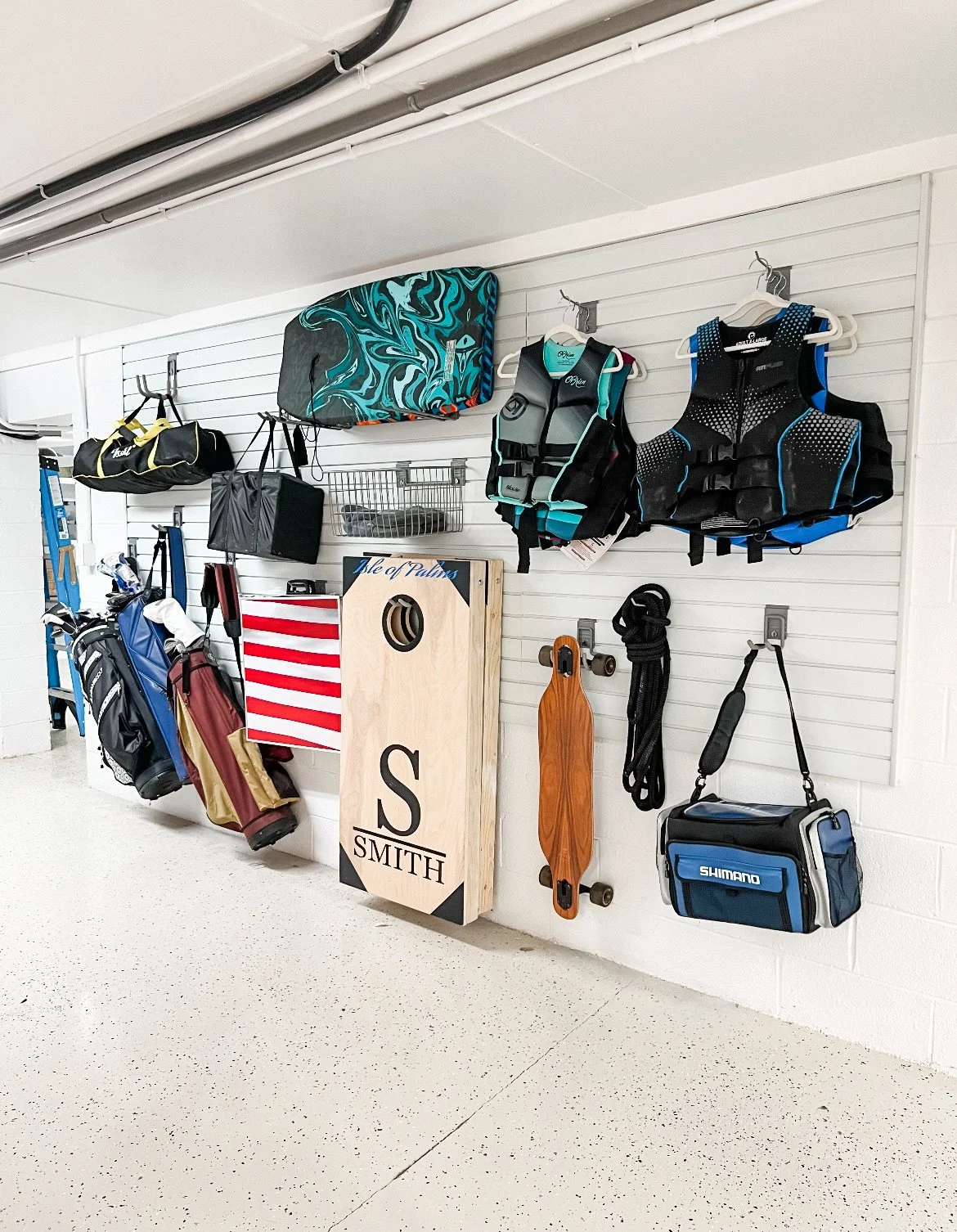 Professional garage organization in Charleston SC with clean, minimal storage systems and labeled bins for a clutter-free space