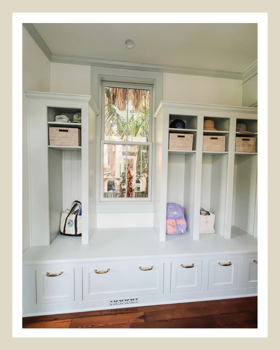 Organized family entryway with built-in cubbies for backpacks, shoes and everyday essentials