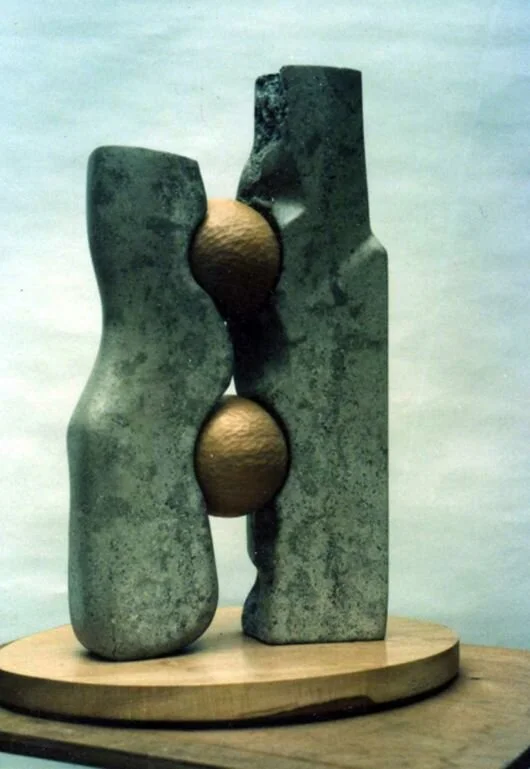 Balancing Act Carved in Nabrasina marble with Cedar of Lebanon balls