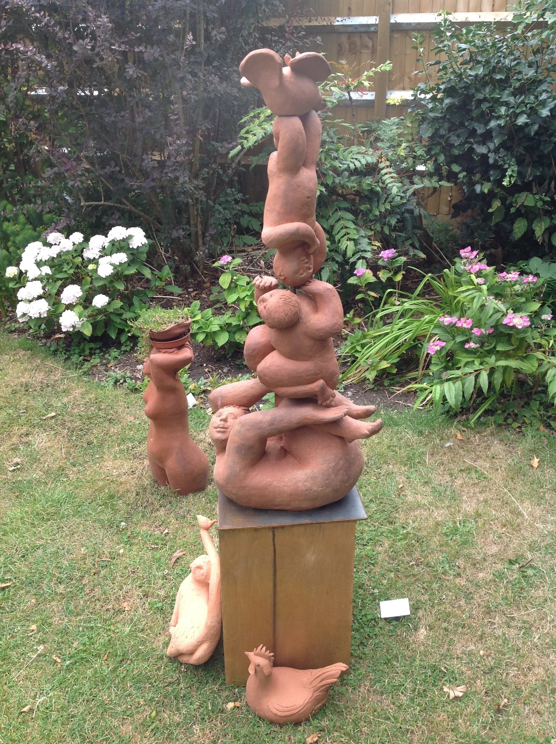   Tower of figures  Terracotta ceramic 