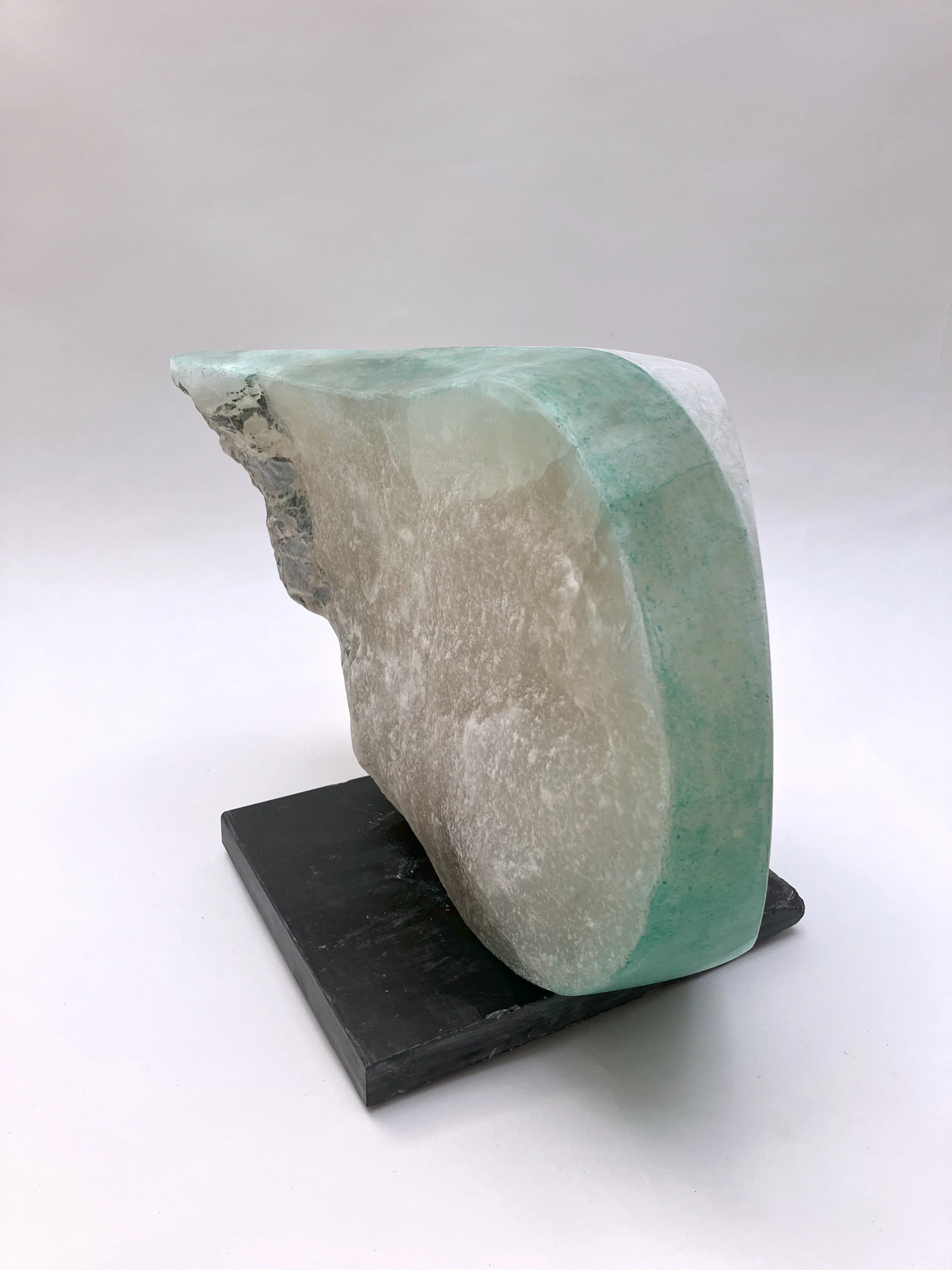 Before And After Gypsum carving on slate base.