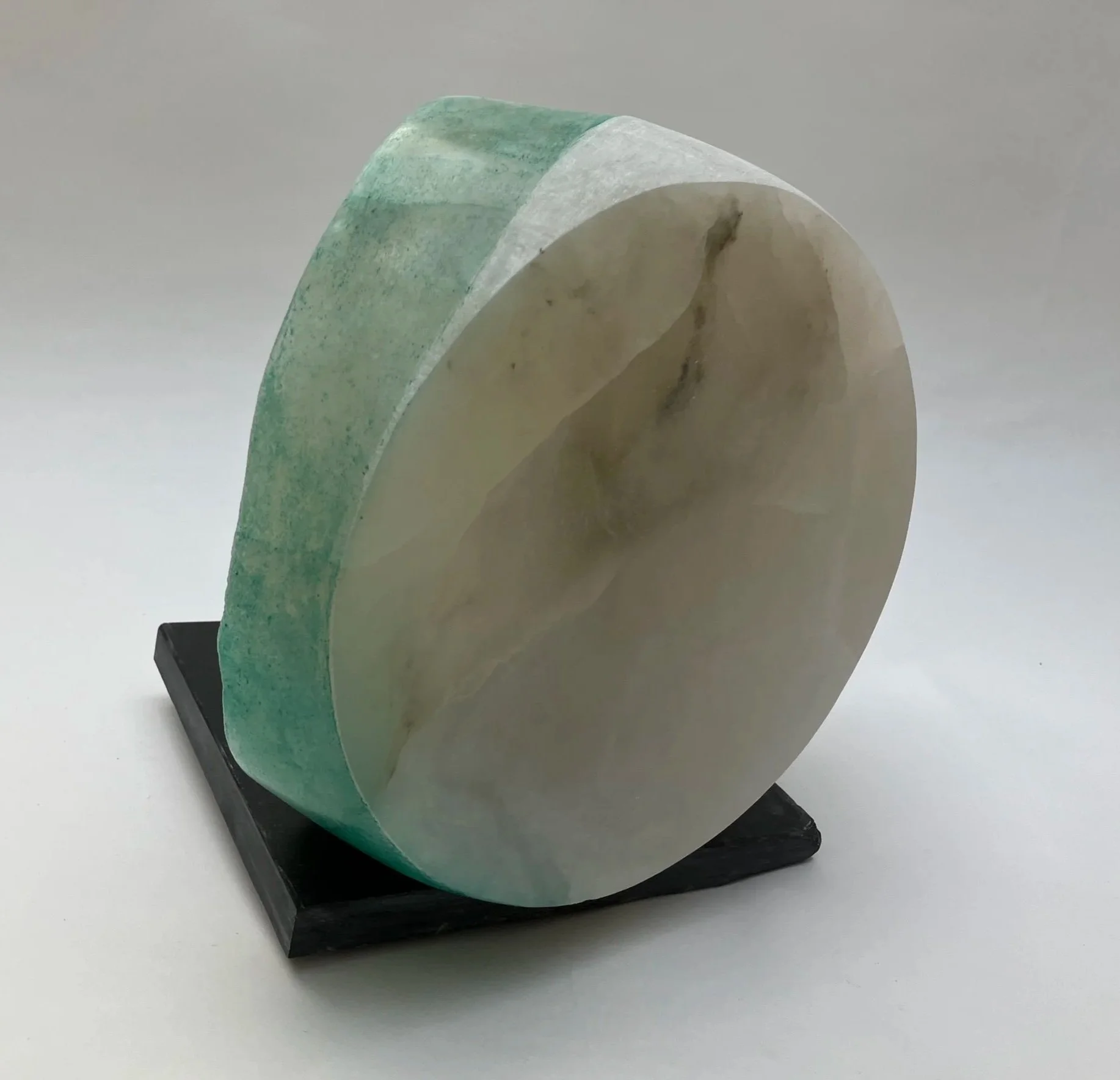 Before And After Gypsum carving on slate base.