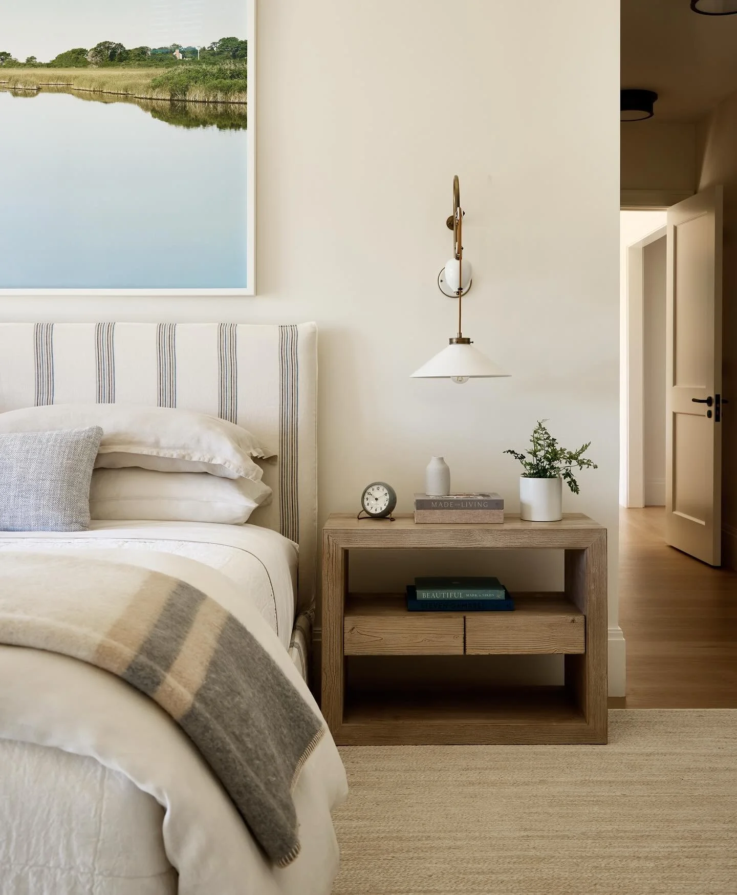 Layered linens, cotton, whitewashed oak, and handmade tile create a warm welcome in this Nantucket Guest Suite. 

Photo @readmckendree