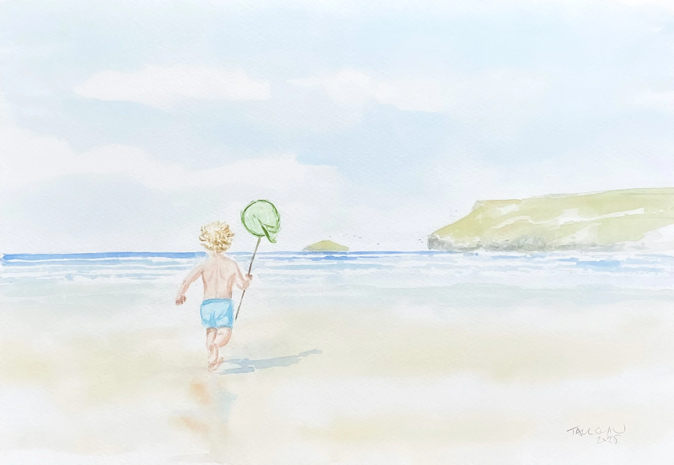 Small boy running on Polzeath Beach in Cornwall.