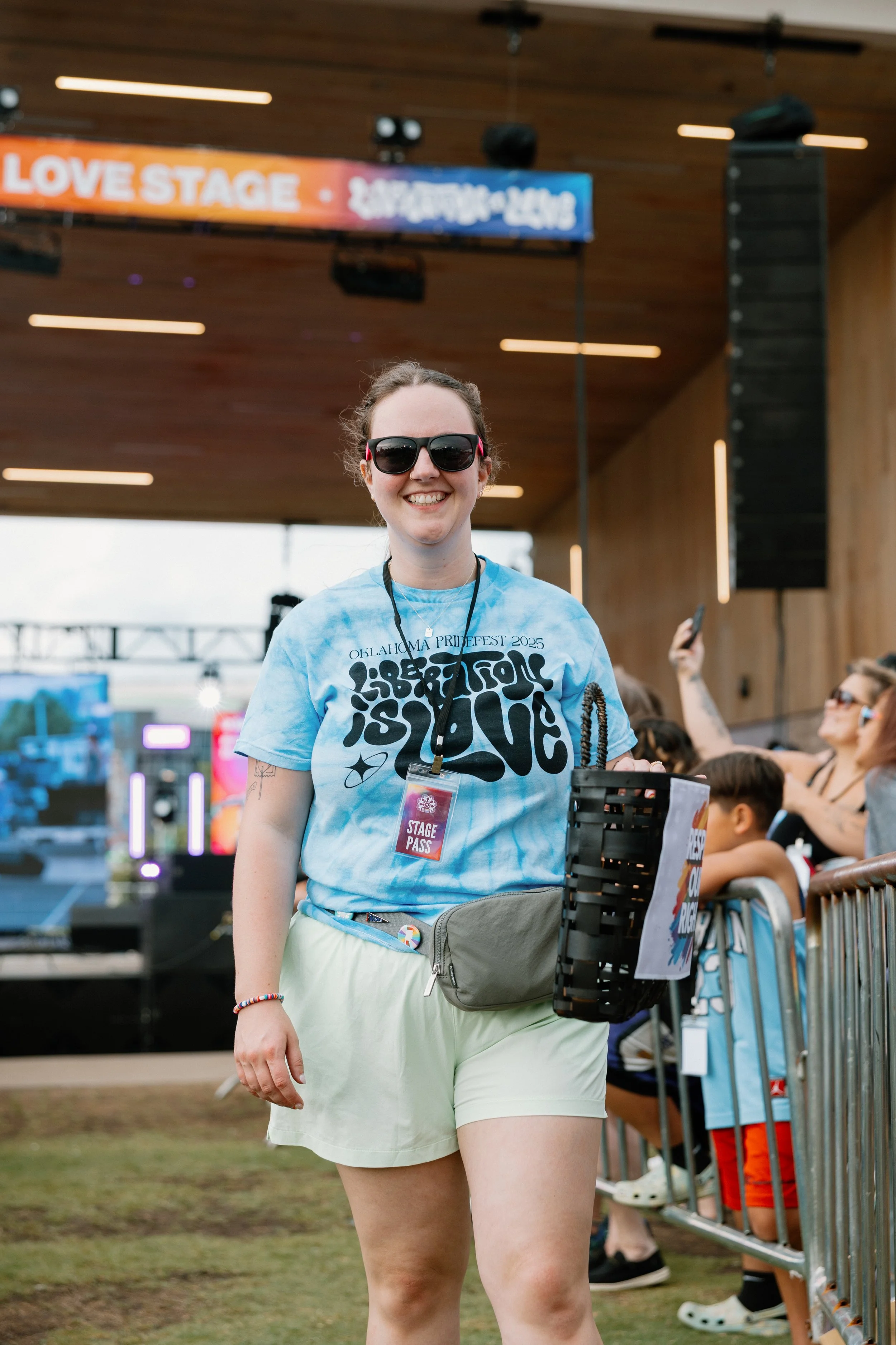 A PrideFest volunteer posing for a photo.