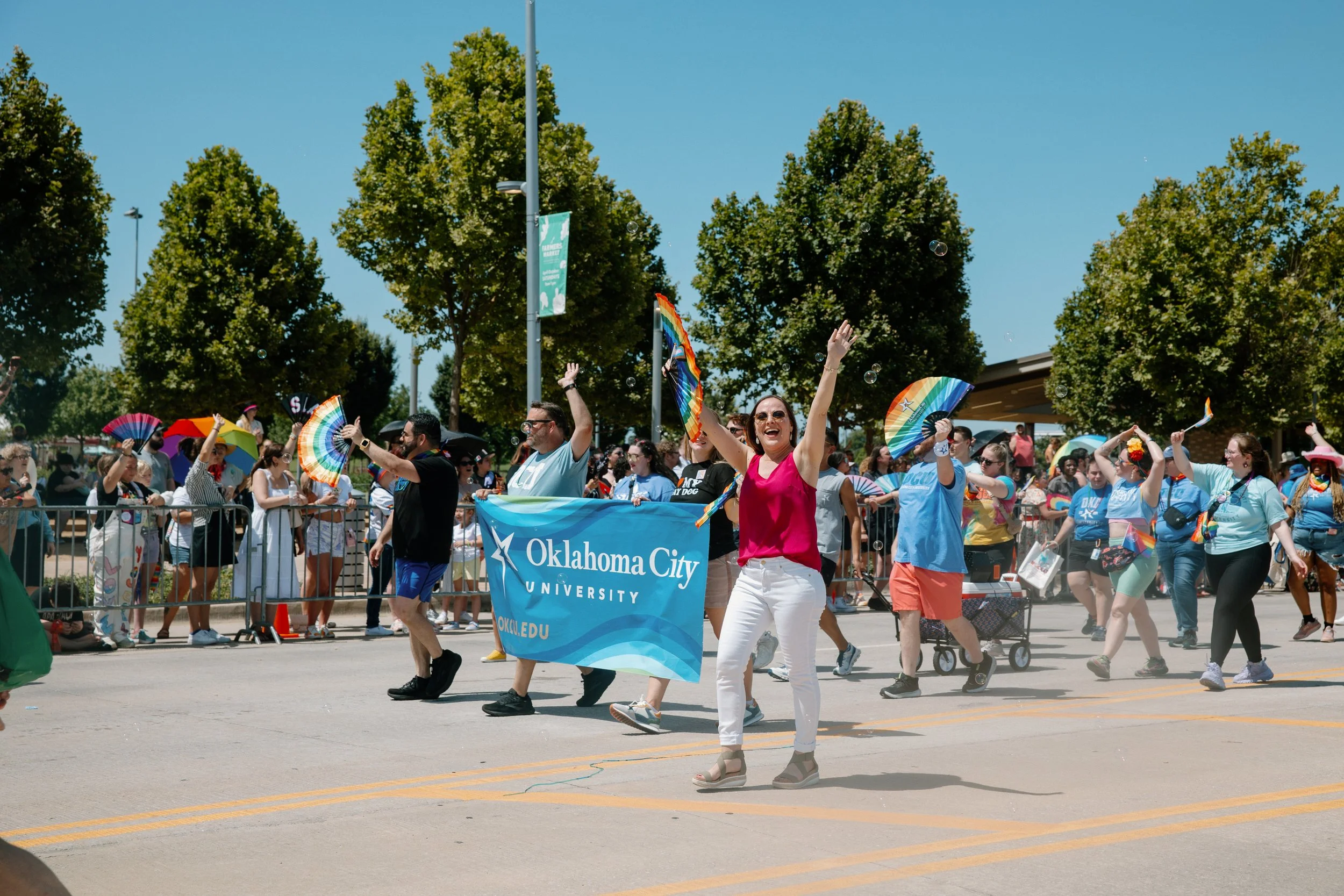 People walking in the PrideFest 2025 Parade.