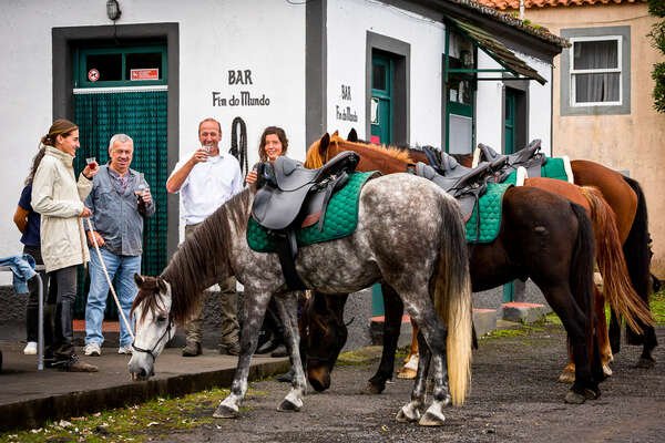 riders-stopping-by-a-bar-and-having-a-drink-1900.jpeg