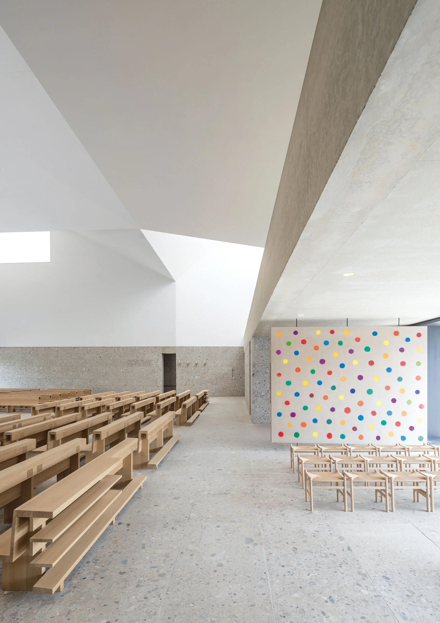 Another interior of different seating arrangements in the back of the Church of Seliger Pater Rupert Mayer
