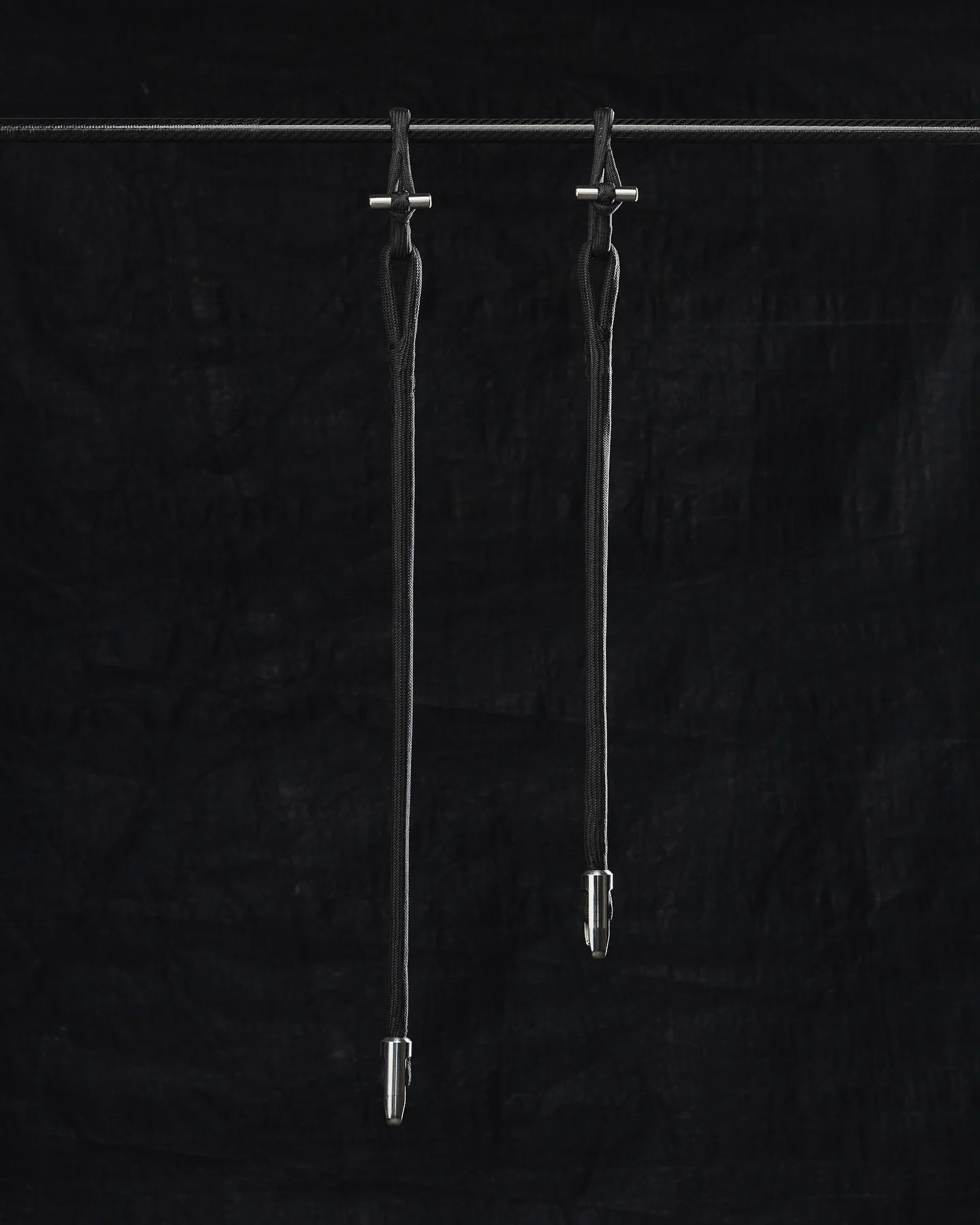 Bones and bullets. A pair of lock strops and dog bones. Built with our in house titanium dogbones, Maffioli Dyneema chafe cover and DSK99 Ultra cores.