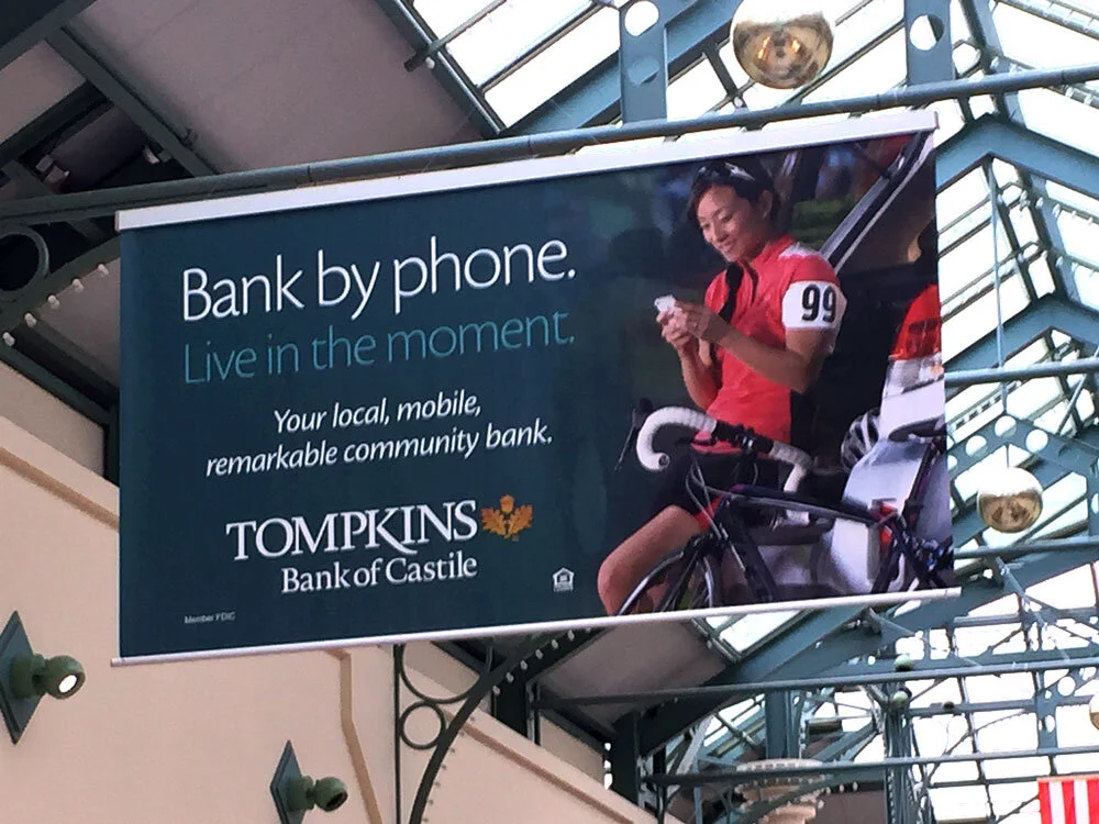 WalkUp Sky Banner mall advertising for Tomkins Bank