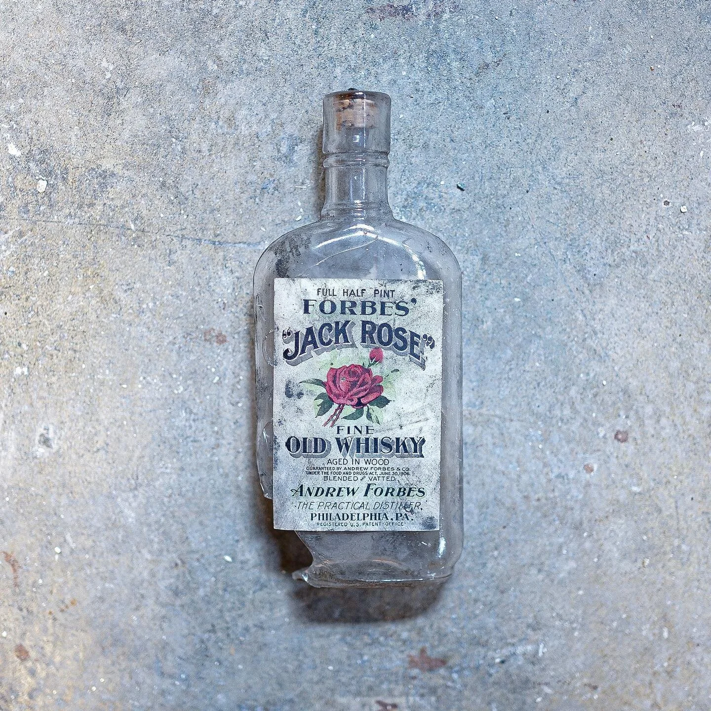 Look at this treasure we found! 

Peter has been doing a ton of work in the basement the past couple of weeks and found this old whiskey bottle up in one of the rafters!
 
After a quick google search I learned, Andrew Forbes &amp; Co. was a pre-prohi
