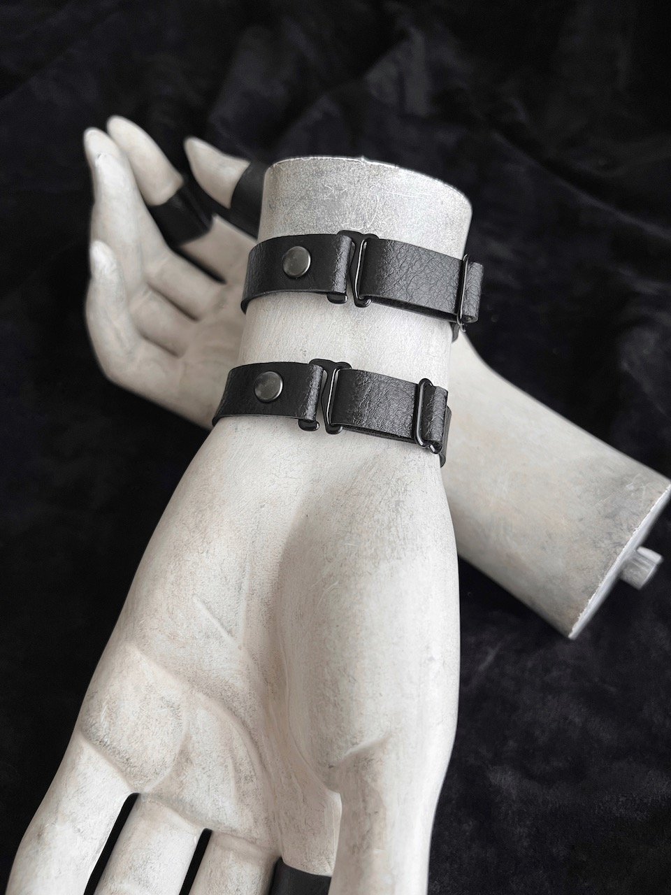 1:2%22 Wide Two Strap Black Vegan Leather Cuffs With Gunmetal O-Rings 5.jpeg