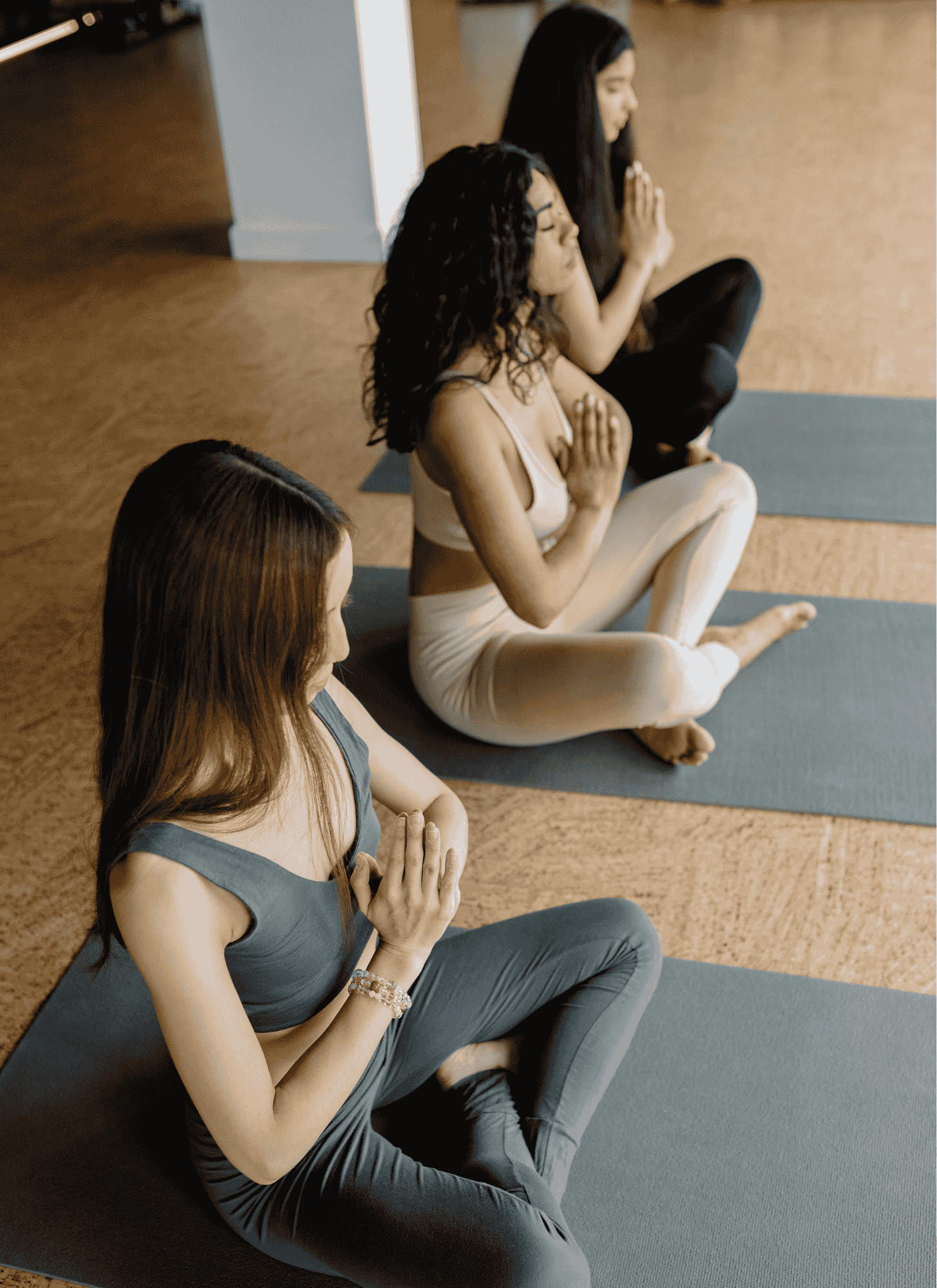 Students practicing yoga & meditation