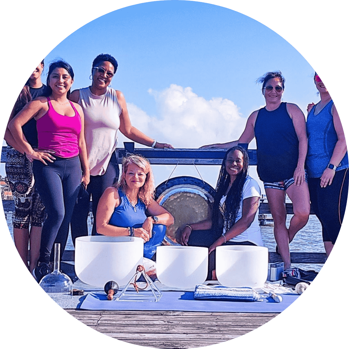 a group of people outdoors at a sound bath