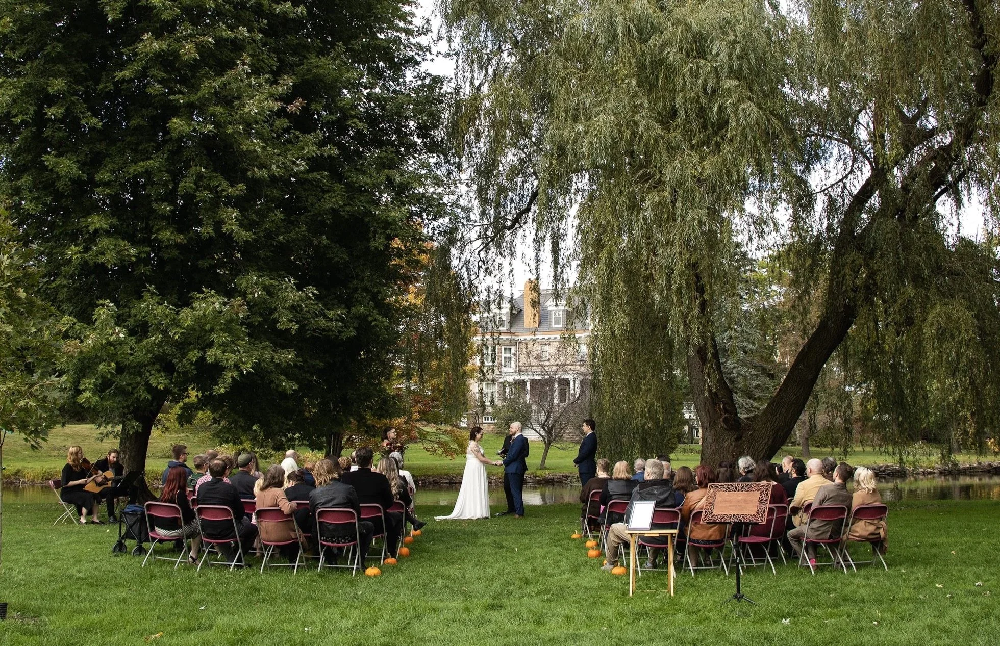 Couple photographed getting married at Stewart Park in Perth on a beautiful early fall day.