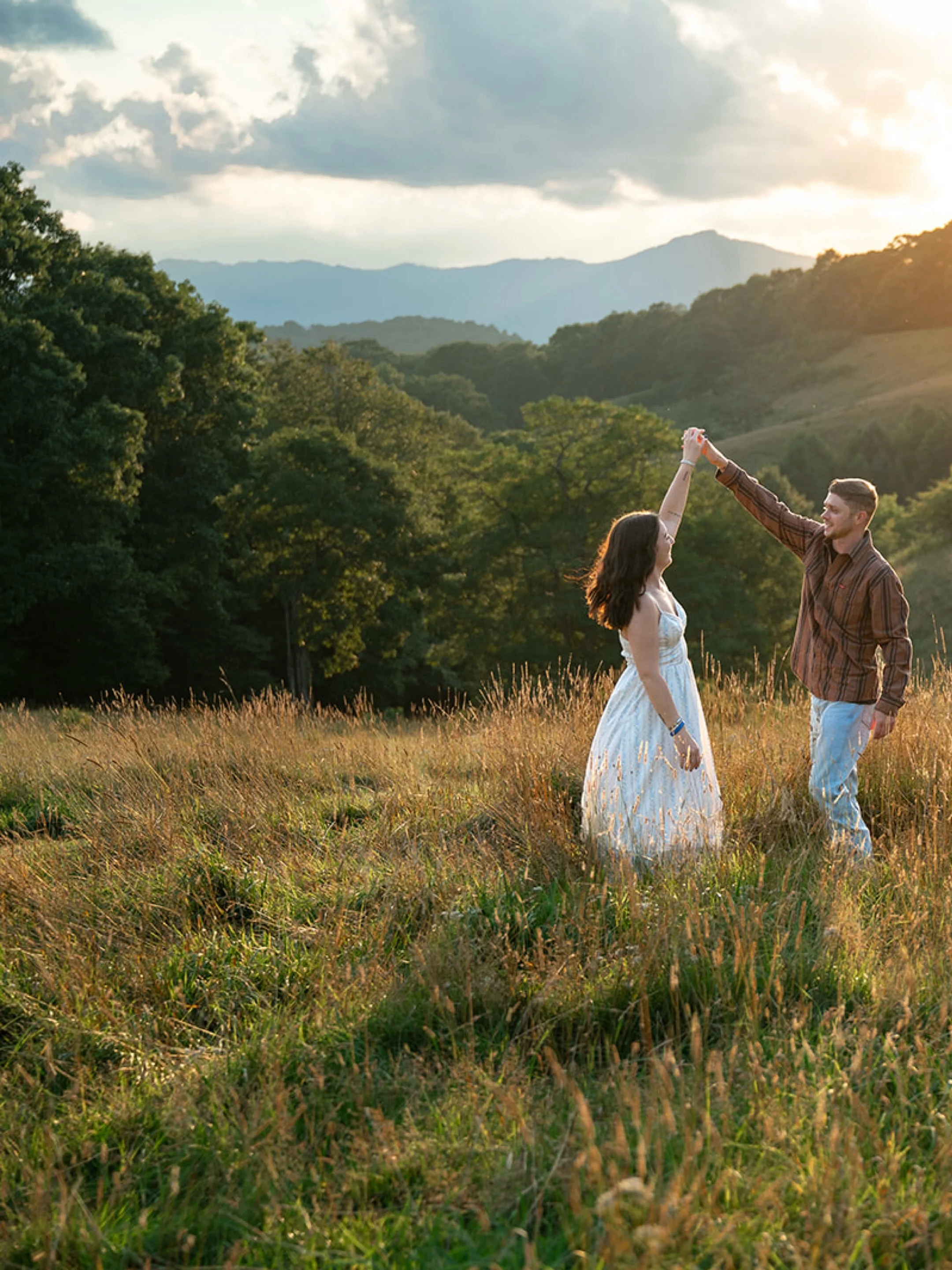 The sun &amp; sky delivered for this engagement session. ☀️ 
I&rsquo;ve had lots of inquiries this week so if you are waiting to hear back from me, thanks for being patient! Still booking for 2027 but dates filling up quick! 💕 
#BooneNCEngagementPho