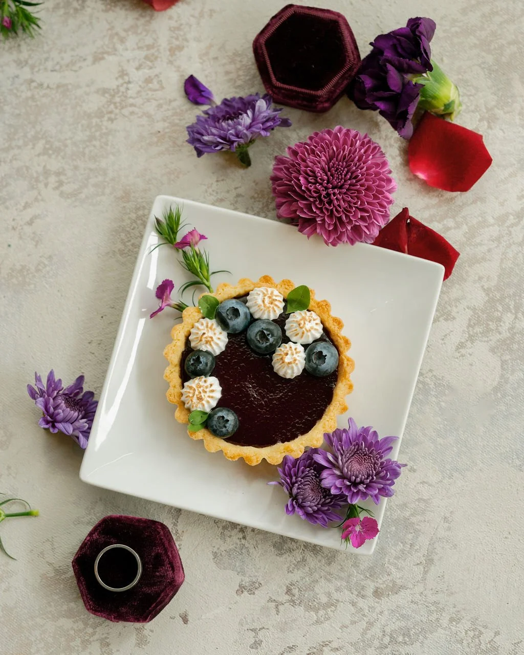   Portland Oregon wedding dessert featuring a custom berry tart with blueberries and cream, styled for an elegant dessert table.  