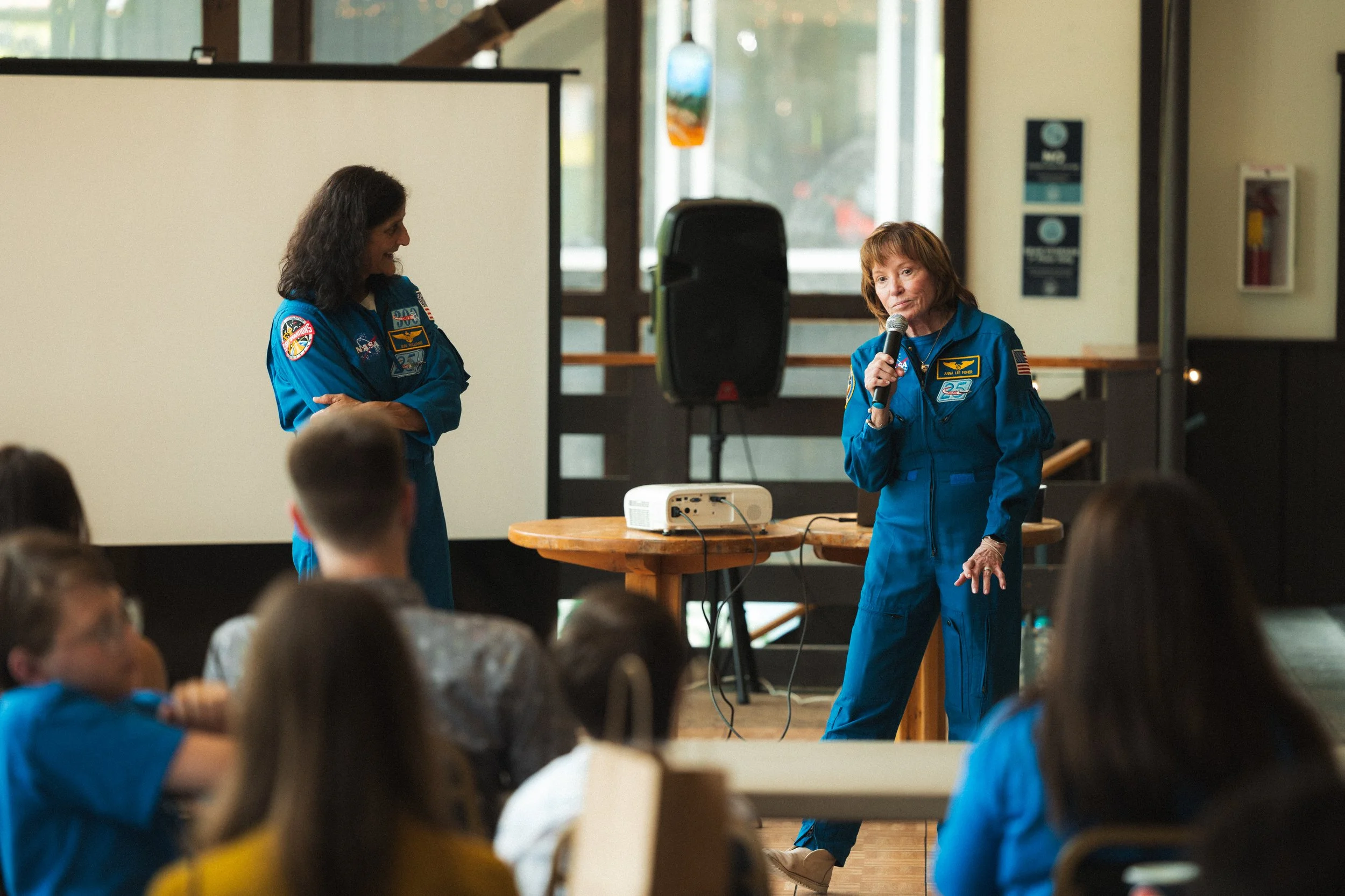 Dr. Anna Fisher and Sunita Williams presenting in Marquette, Michigan