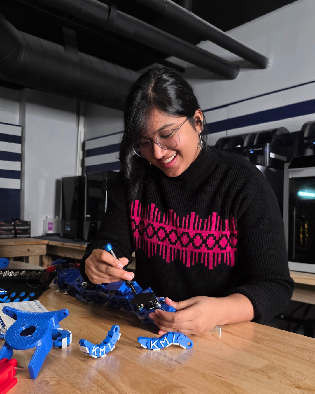 KMI Robotics Engineer Preksha Madhva with REACCH tentacle