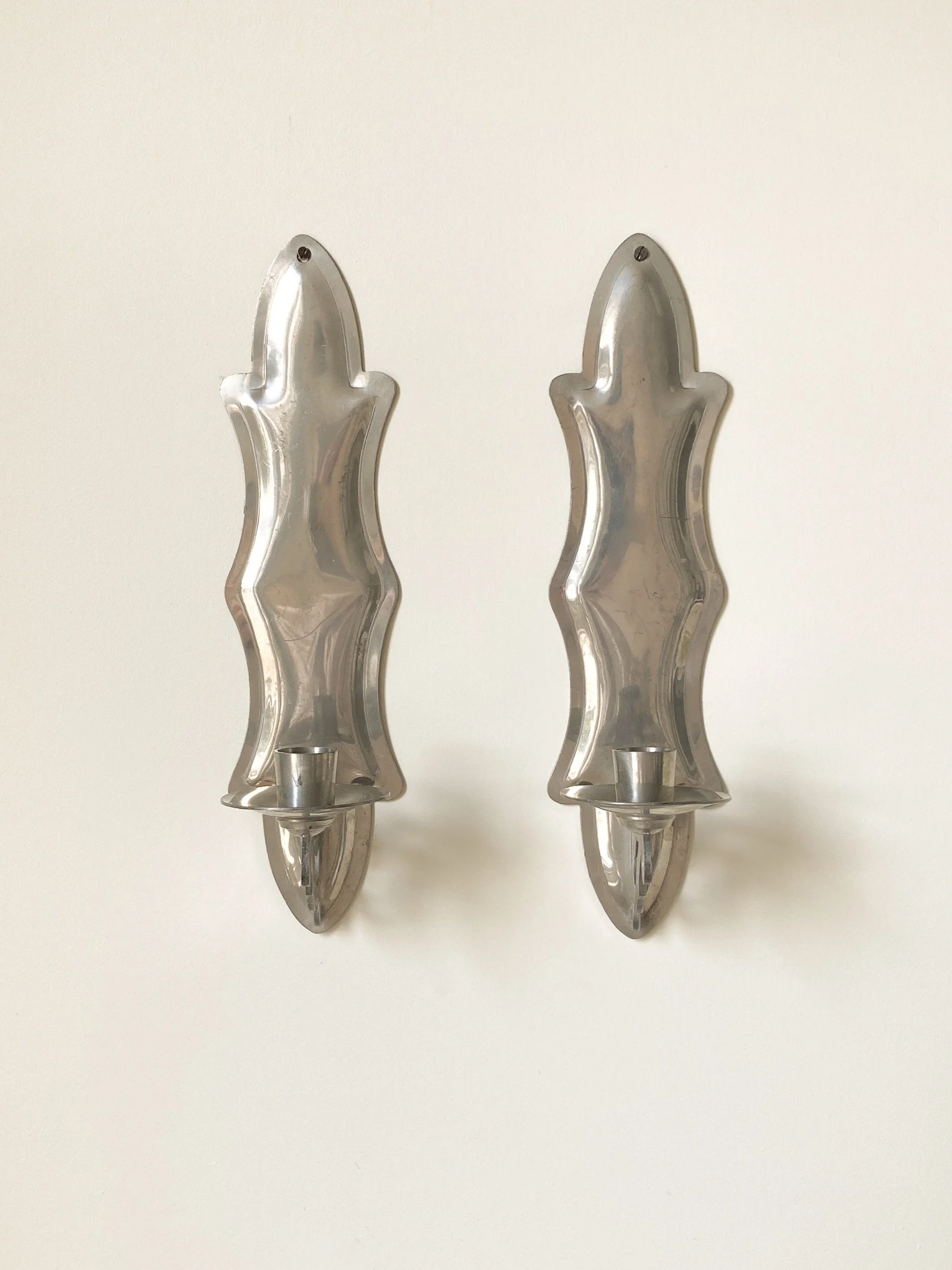vintage-silver-pewter-pair-flame-edge-candle-sconces-1-the-diarist.jpg