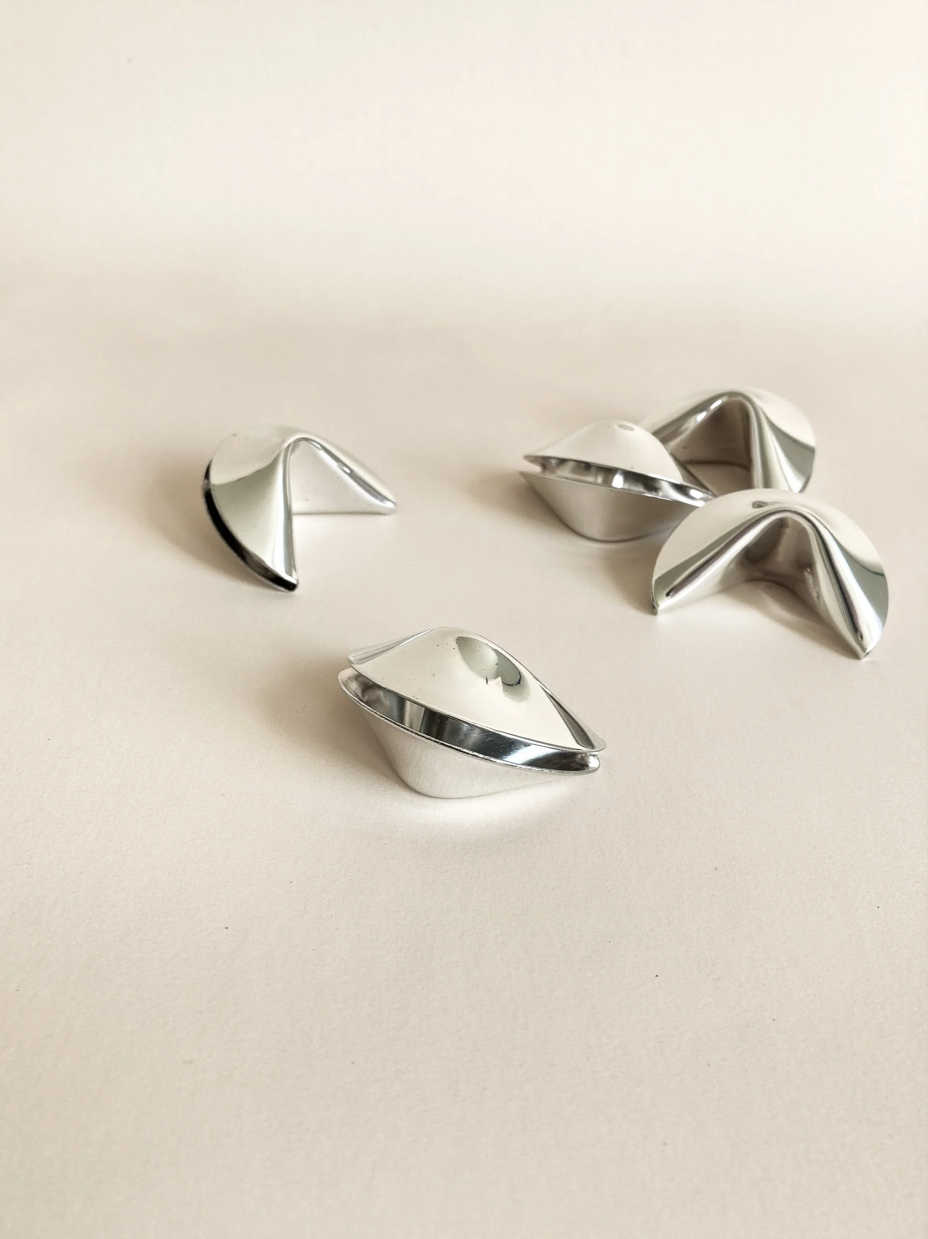 vintage-set-of-silver-plated-fortune-cookie-place-card-holders-1-the-diarist.jpg