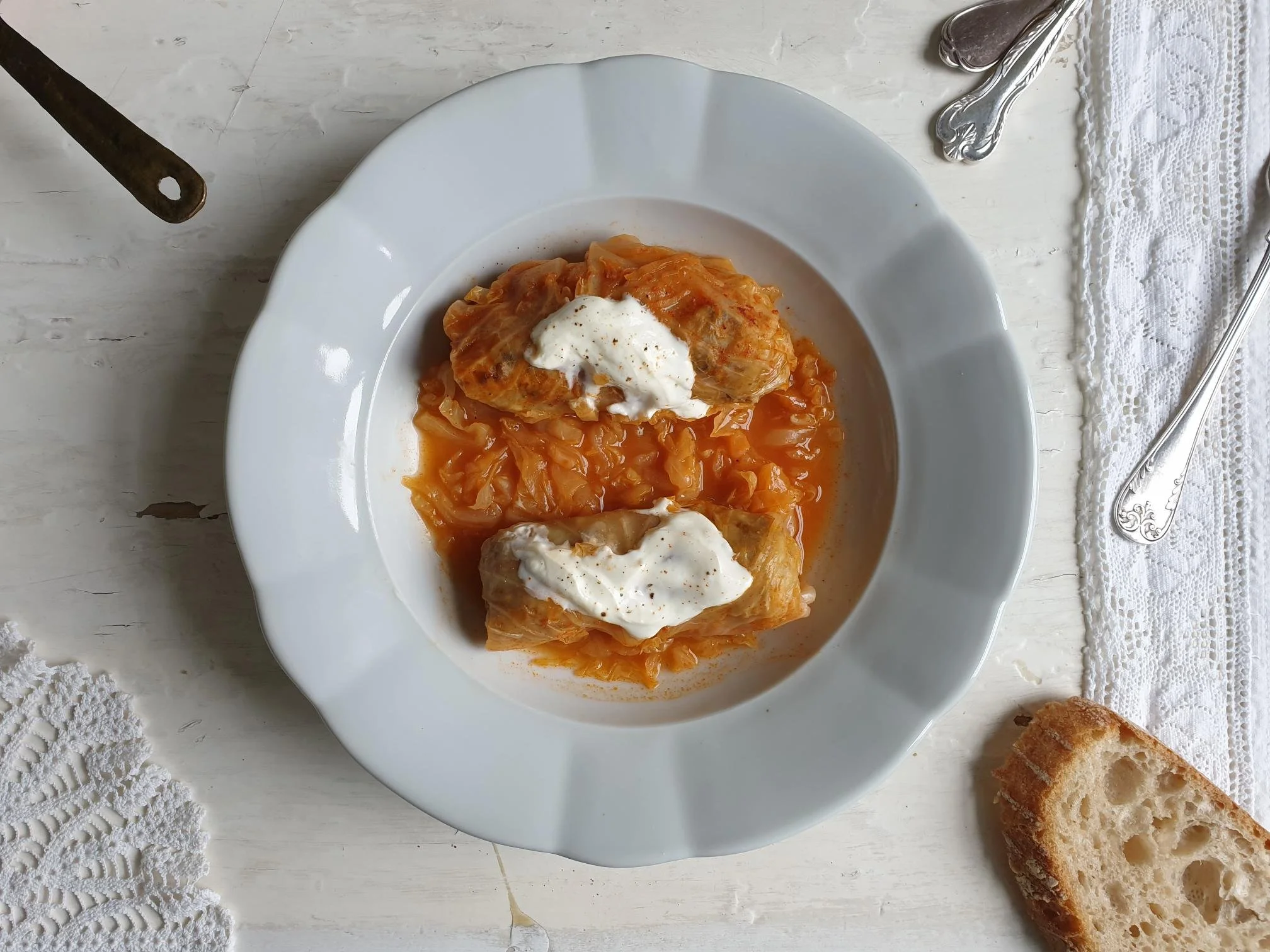 Sarme - Pickled cabbage leaves stuffed with minced meat and rice in a light tomato sauce