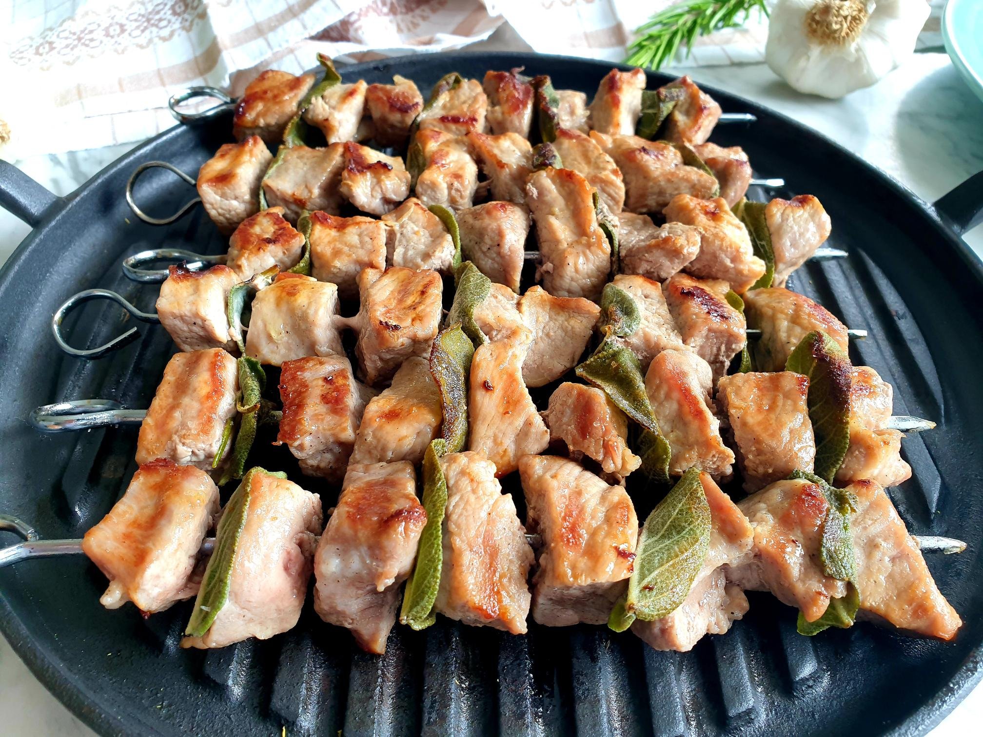 meat skewers in a frying pan — Recipe of the week — Beans & Sardines