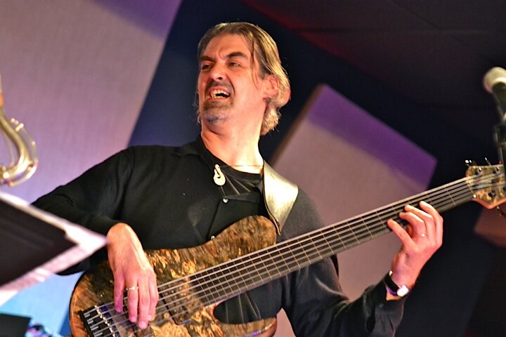 Performing with my Fodera fretless 6-string “Pfeiffer Signature” model in early 2012