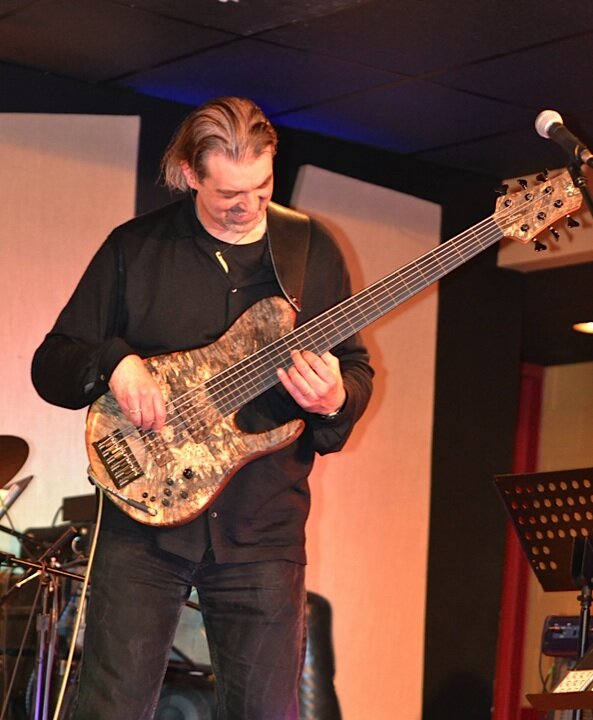 …and getting into it on the “Pfeiffer Signature” Fodera bass!