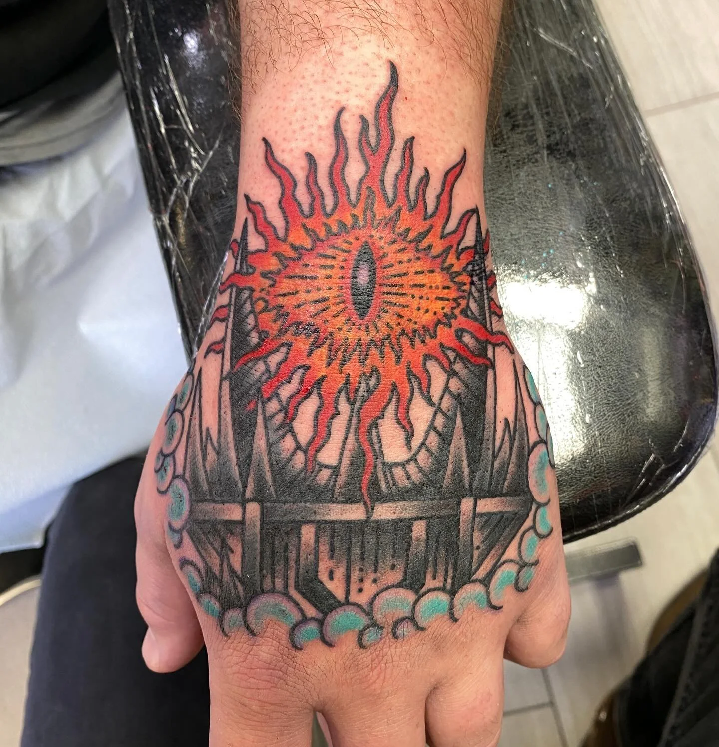 &ldquo;A great eye, lidless, wreathed in flame.&rdquo; By @turnermade thank you Josh! #rattlesnaketattoo #wichita #lotr #eyeofsauron