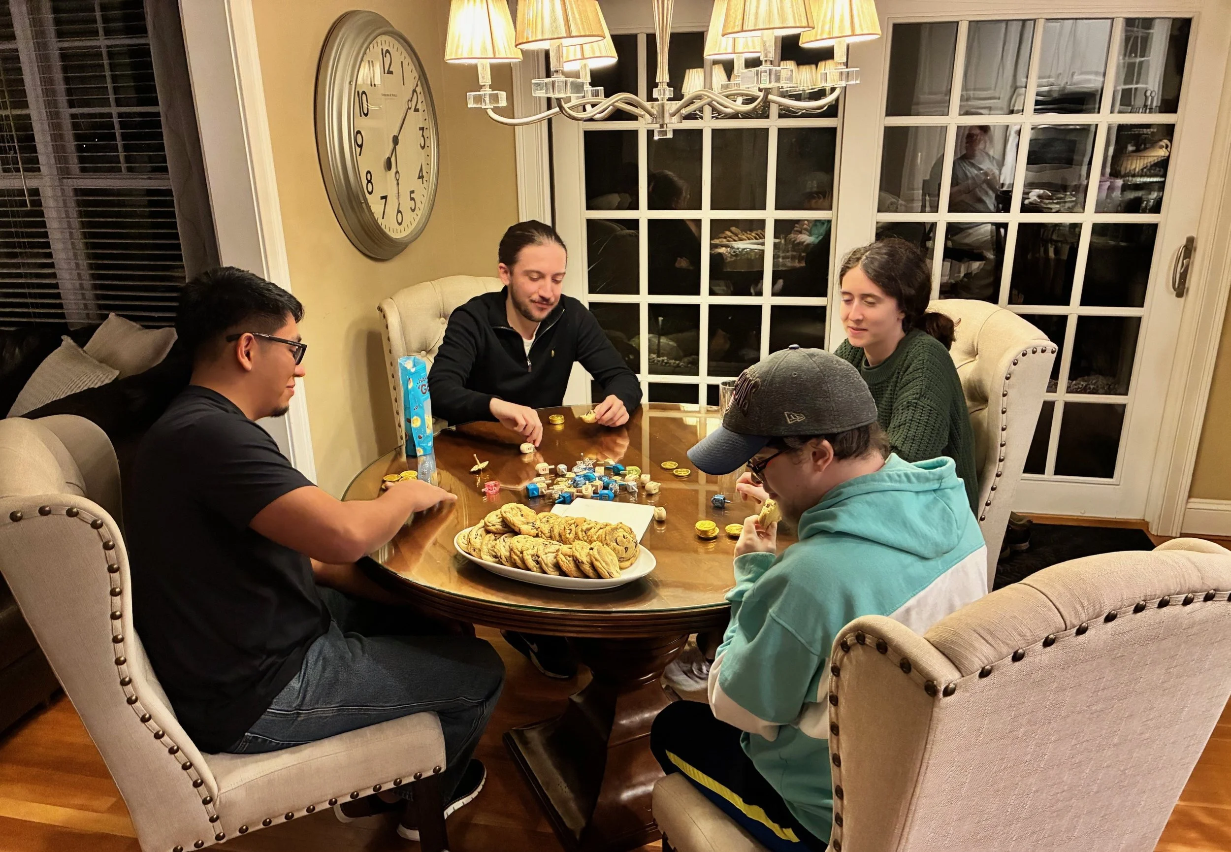 Simchat Yisrael Young Adult Group having a Hanukkah meetup