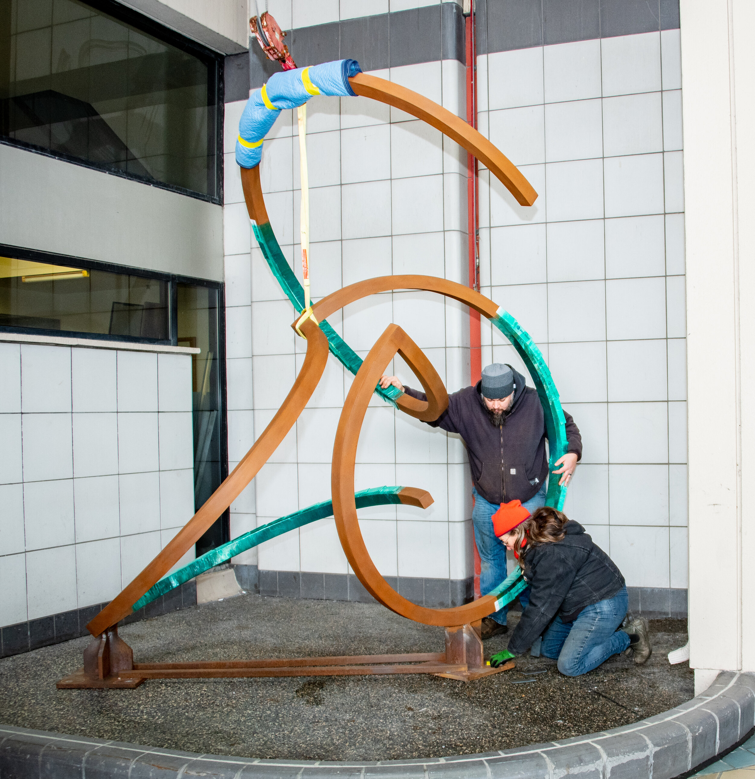  Project Management for the creation and installation of an exterior sculpture walk at Pittsburgh International Airport. Shown here, installation in progress by artist Dee Briggs.  Photo by Beth Hollerich  