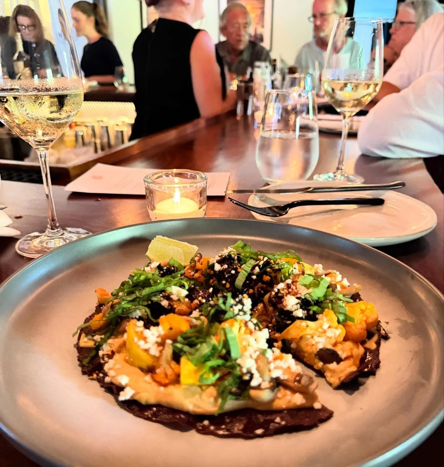 @communitytablect is the place to be — lively, delicious, and full of good energy. You can go any night, but I loved Monday (yes, burger night… though I didn’t even have a burger!). 
Instead, I dove into dishes like:
Grilled stone