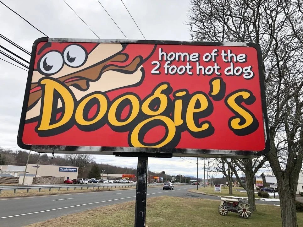 When cruising on the Berlin Turnpike, be sure to stop by @doogies_restaurant in Newington for their famous two-foot-long hot dog or one of the other dozen-or-so hot dog varieties. 

There are several tempting burgers and pretty decent deep-fried seaf