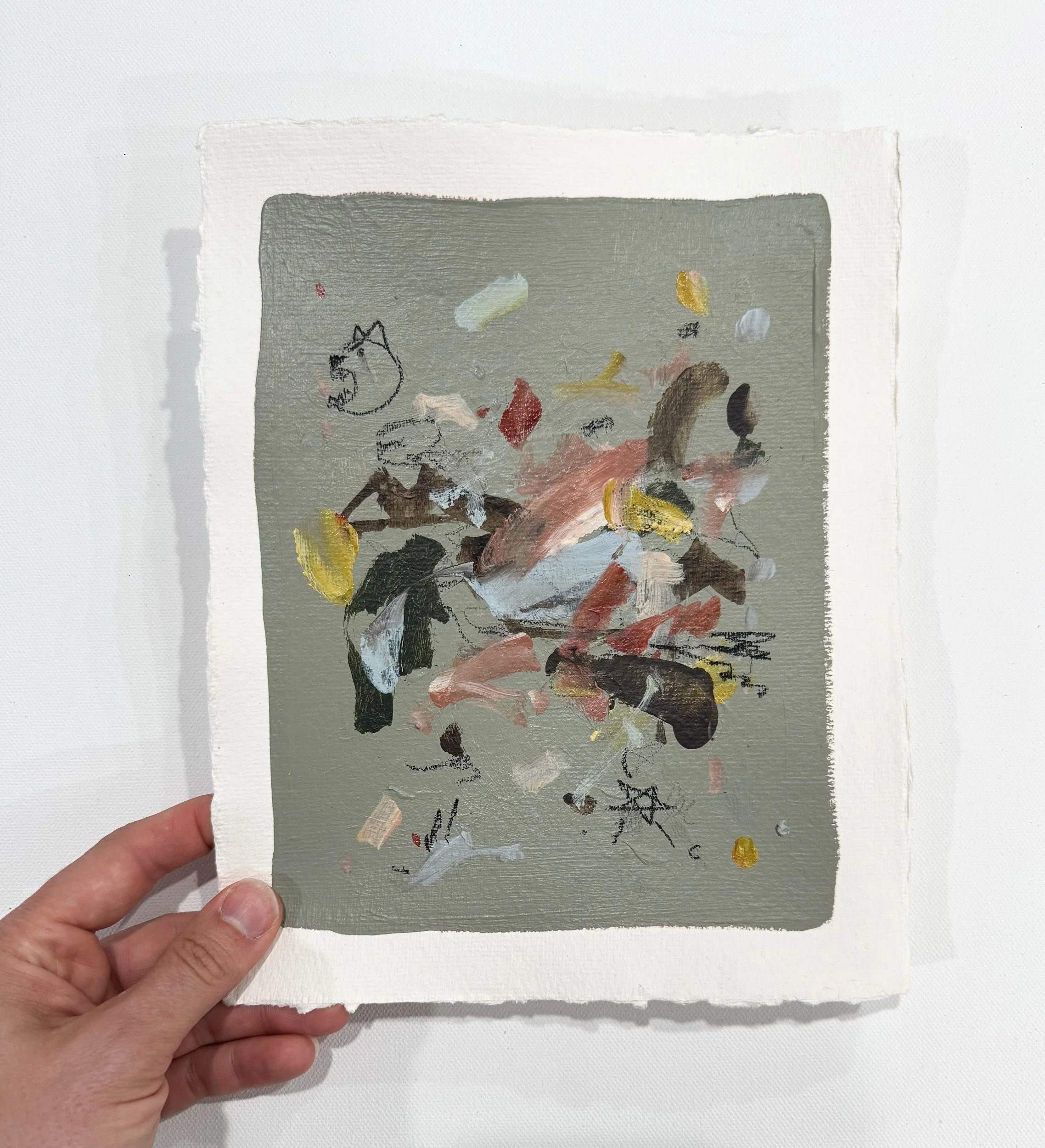 original abstract painting with a soft green background and multicolor marks on handmade watercolor paper with deckled edges