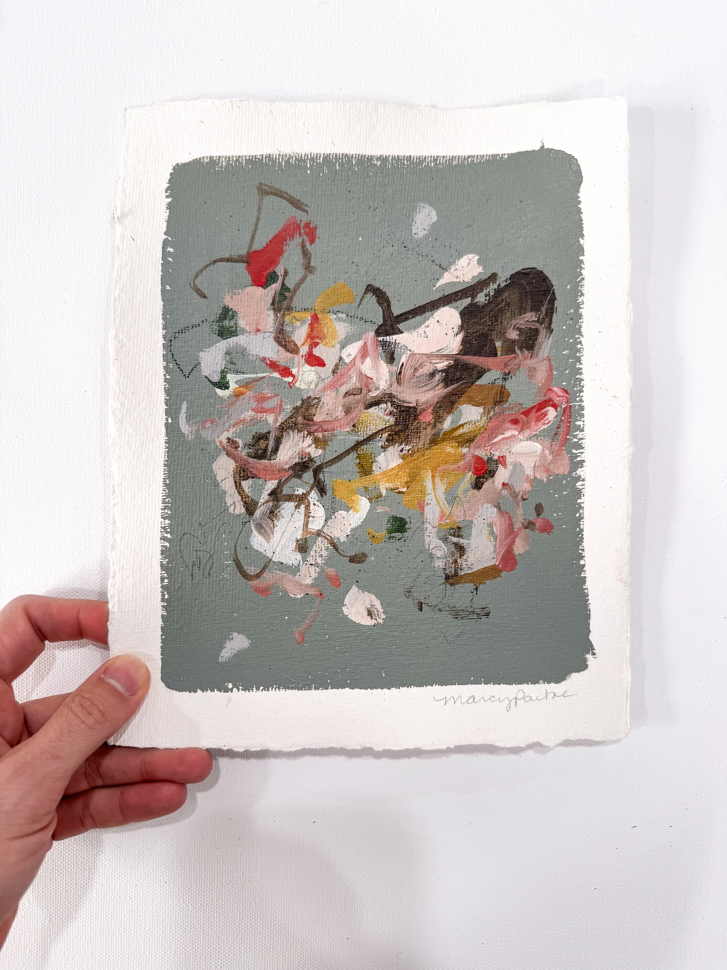 Small original abstract painting on handmade paper with dark sage green background and multicolor marks