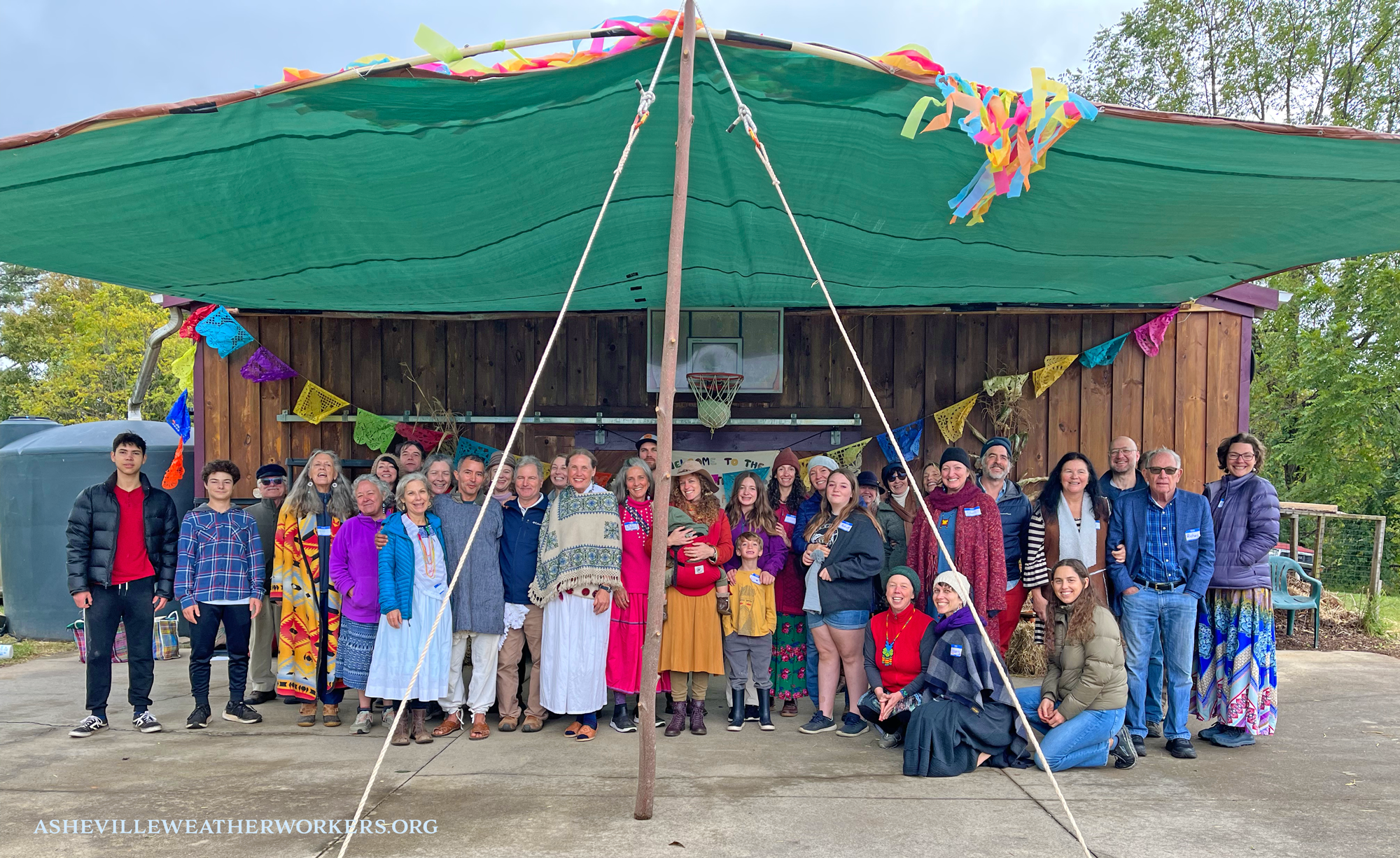 31-Asheville-Traditional-Weather-Harvest-Festival-ceremony-2022-Asheville-weather-workers-group-shot.png