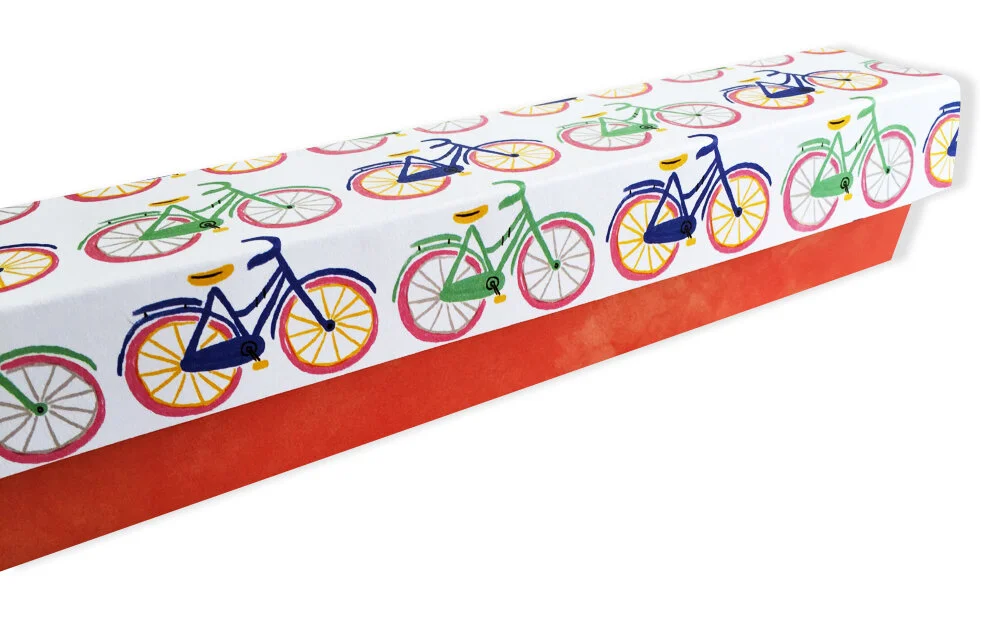 If you use a pattern paper like I did with the bicycles from Finders Keepers, be sure to plan how the pattern will view on the short flap on the front of the box. Plan placement from the front to the back. Since the box folds, you can measure and sc…