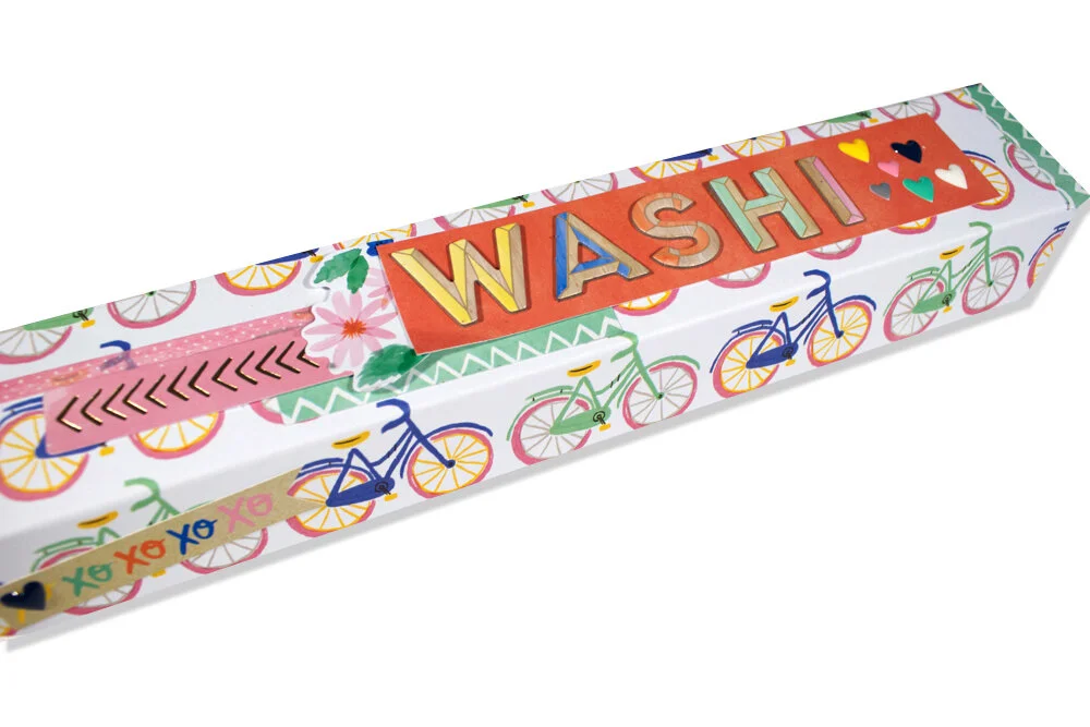 On the back I punched circles from one of the paper selections in Amy’s collection and glued in a strip, adding a die cut decoration.  