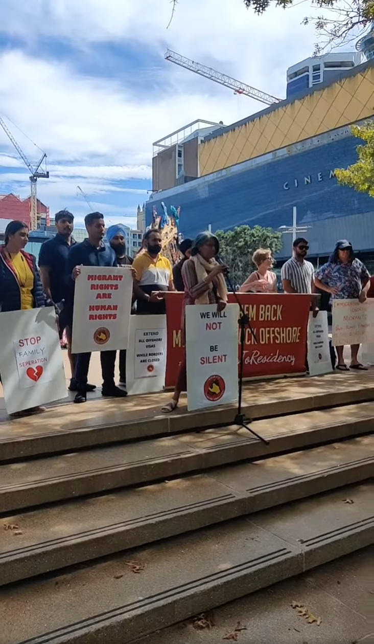 Migrant rally 1.PNG