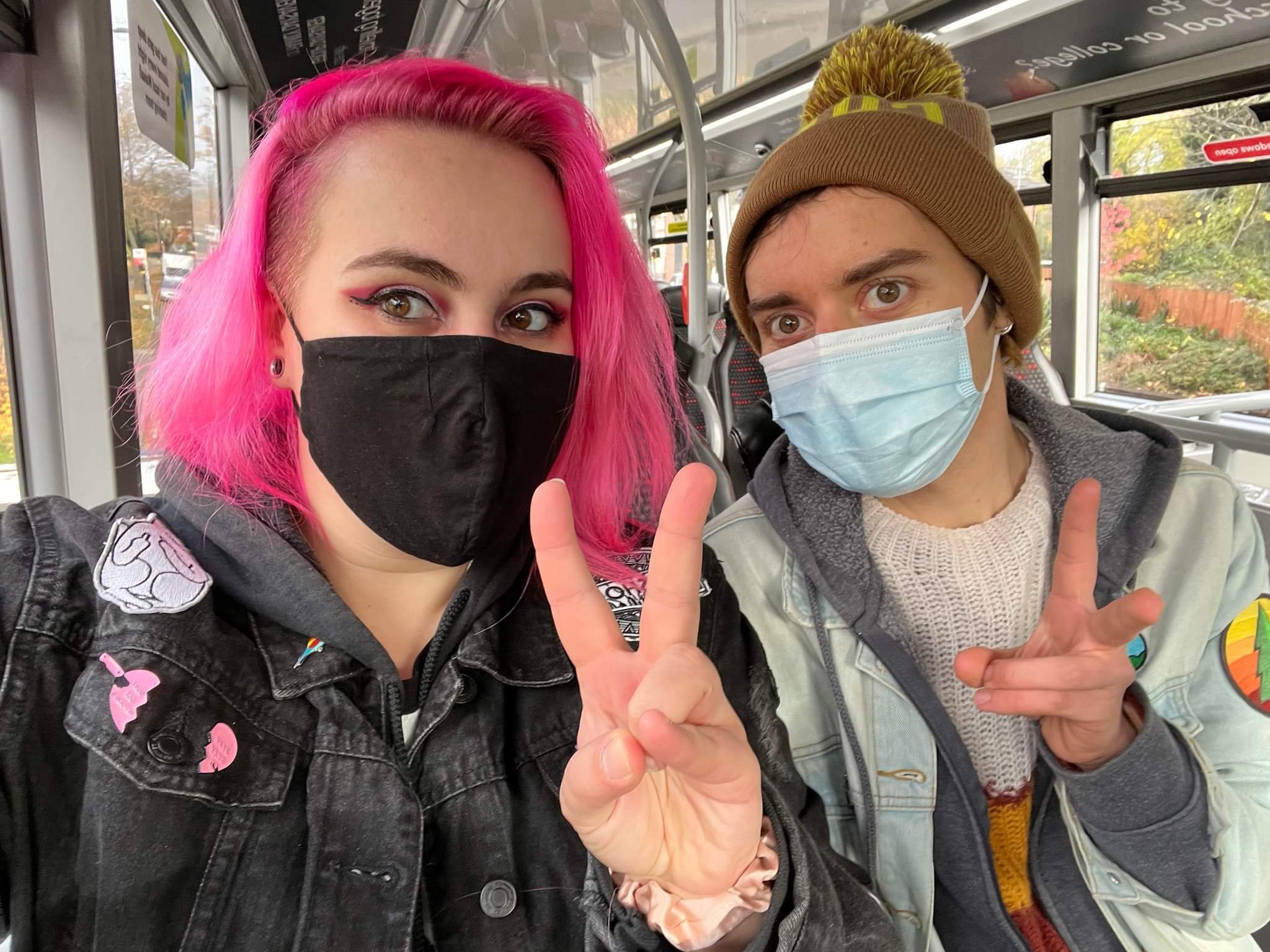 Shannon (left) and Luke (right) peace signing their way through life