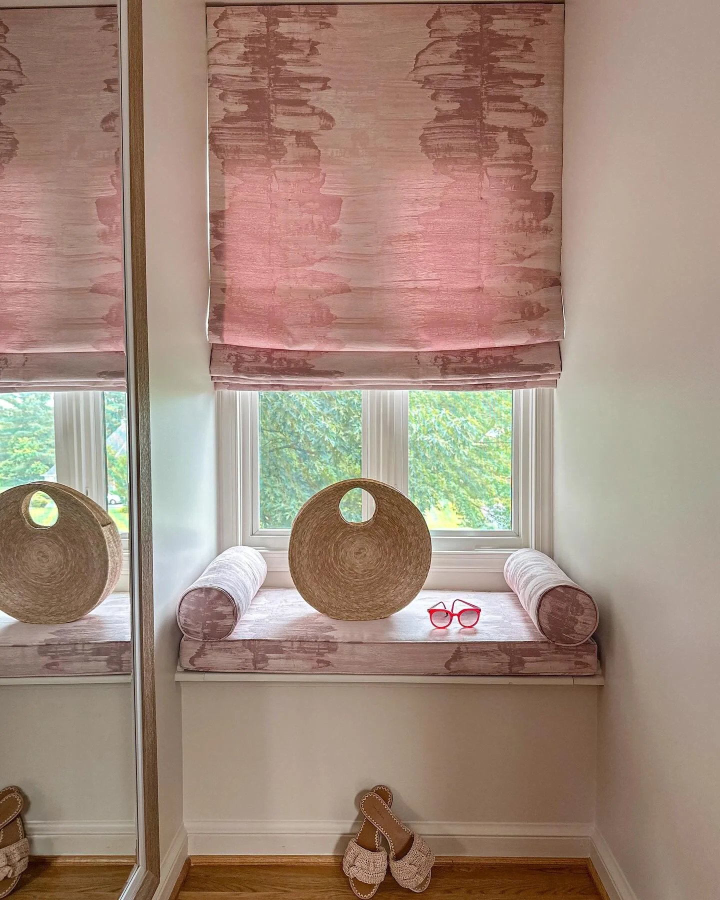Summertime, pretty textures, and a well-deserved moment of calm. Loving how this dreamy window seat turned out&mdash;complete with summer accessories and a custom roman shade. The perfect little escape in a newly renovated office + lounge for a power
