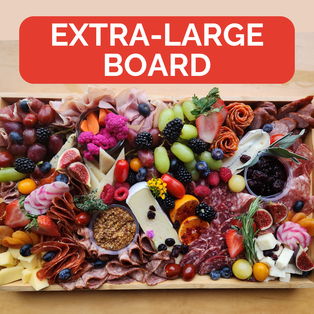 Gourmet charcuterie board from Meuwly's in Edmonton, featuring cured meats, artisan cheese, and more