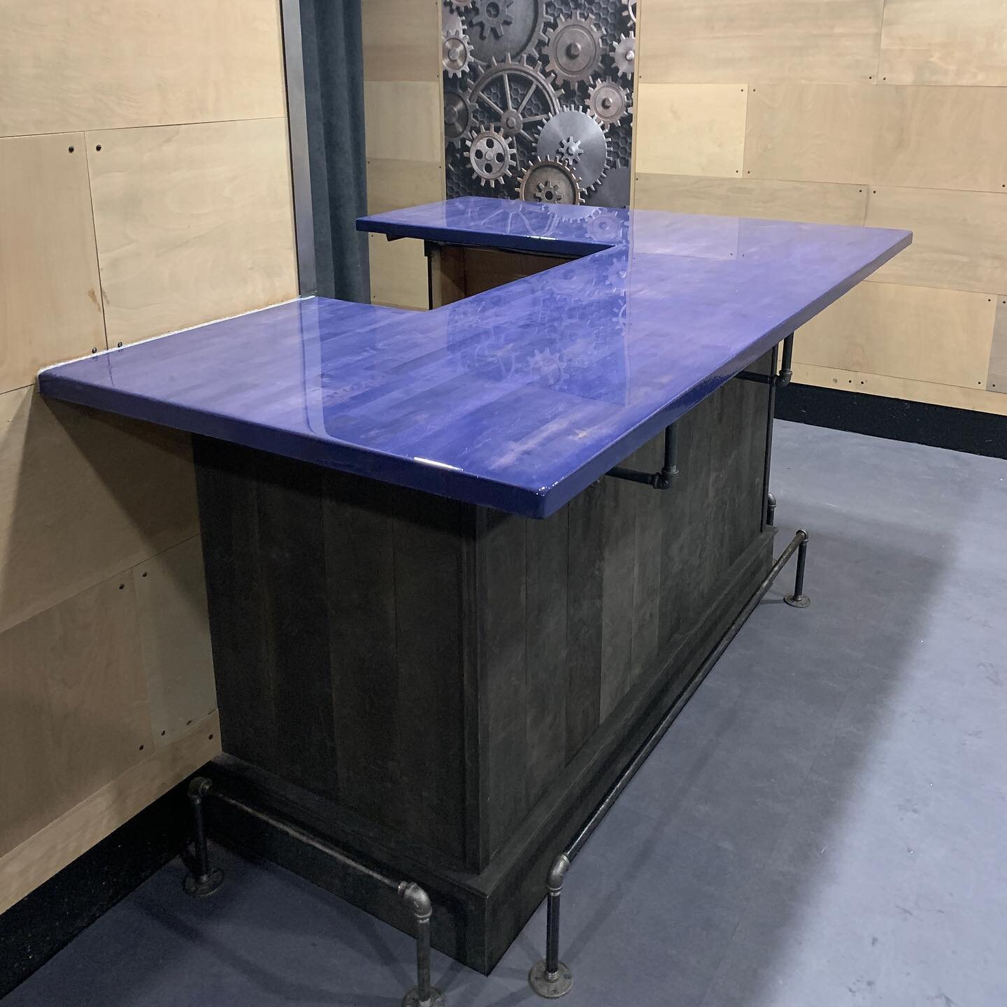 This is one awesome bar! We recently refinished it by stripping it back to the original  butcher block countertop, staining it with Varathane tintable wood stain and then coating the entire thing with MAS Table Top Pro Epoxy. Swipe to see the progres
