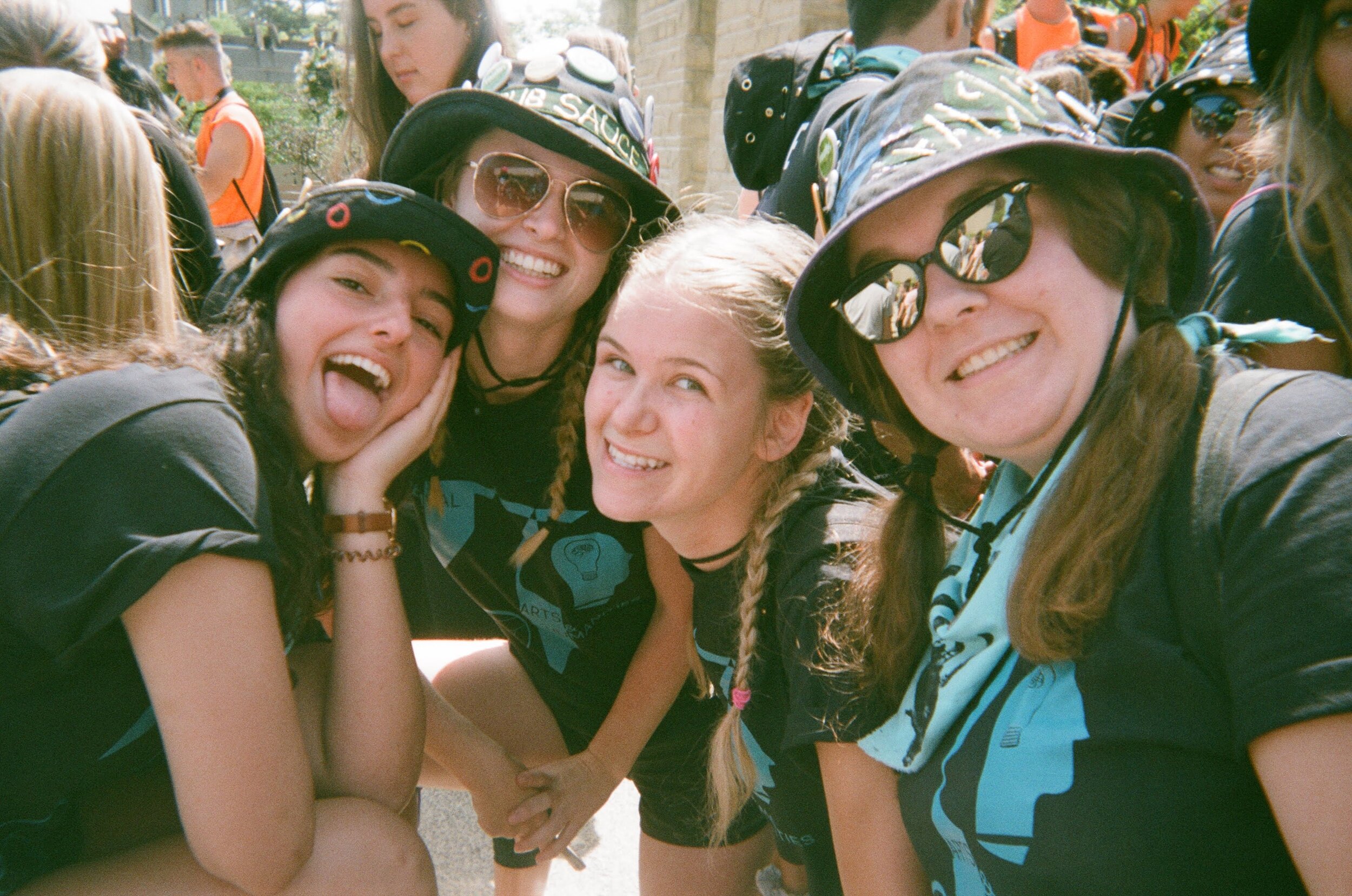 Four Art sophs waiting tiredly in a long line awaiting lunch that took nearly 3hrs to arrive.