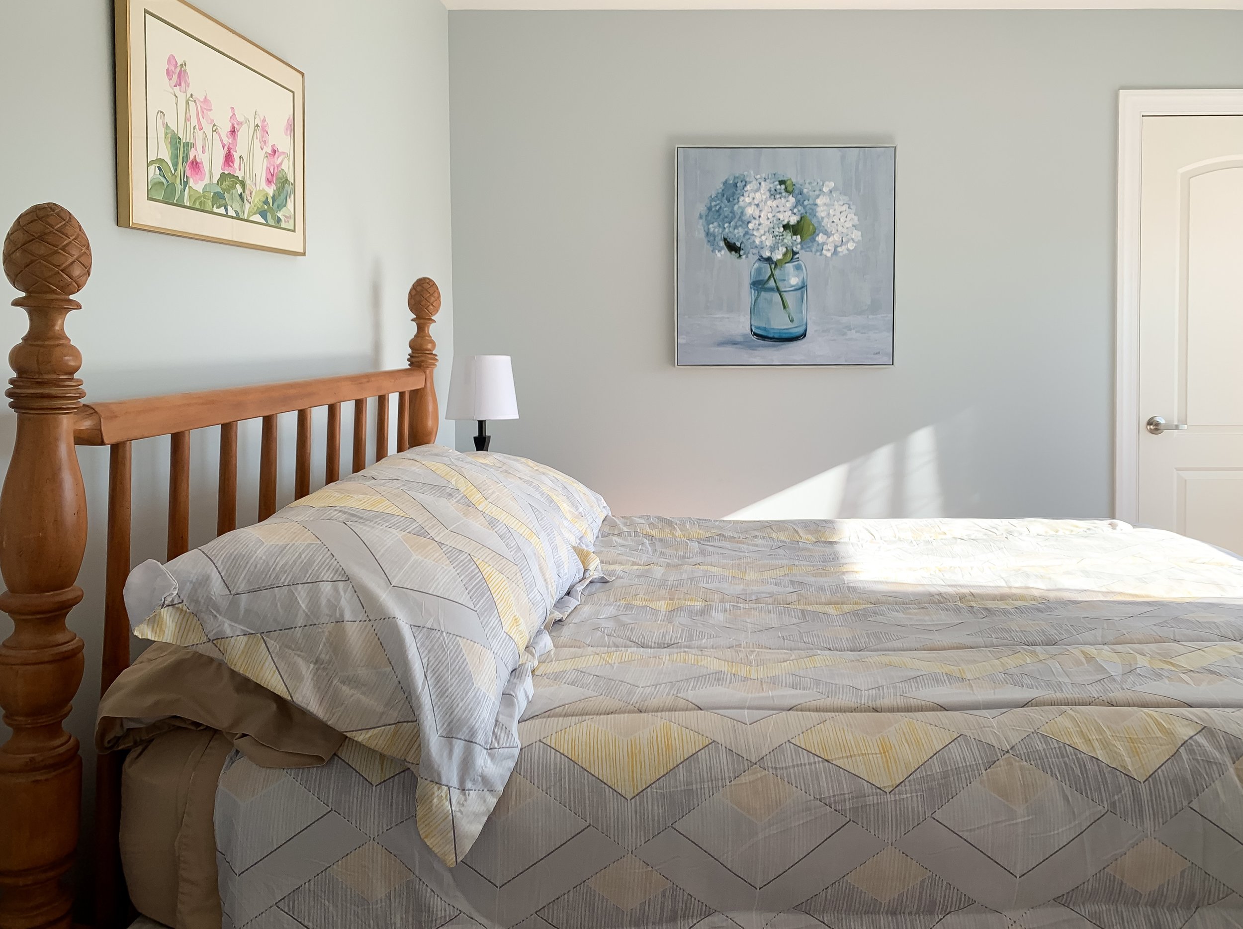 Guest bedroom in NEPA prefab lakehouse light blue.JPEG