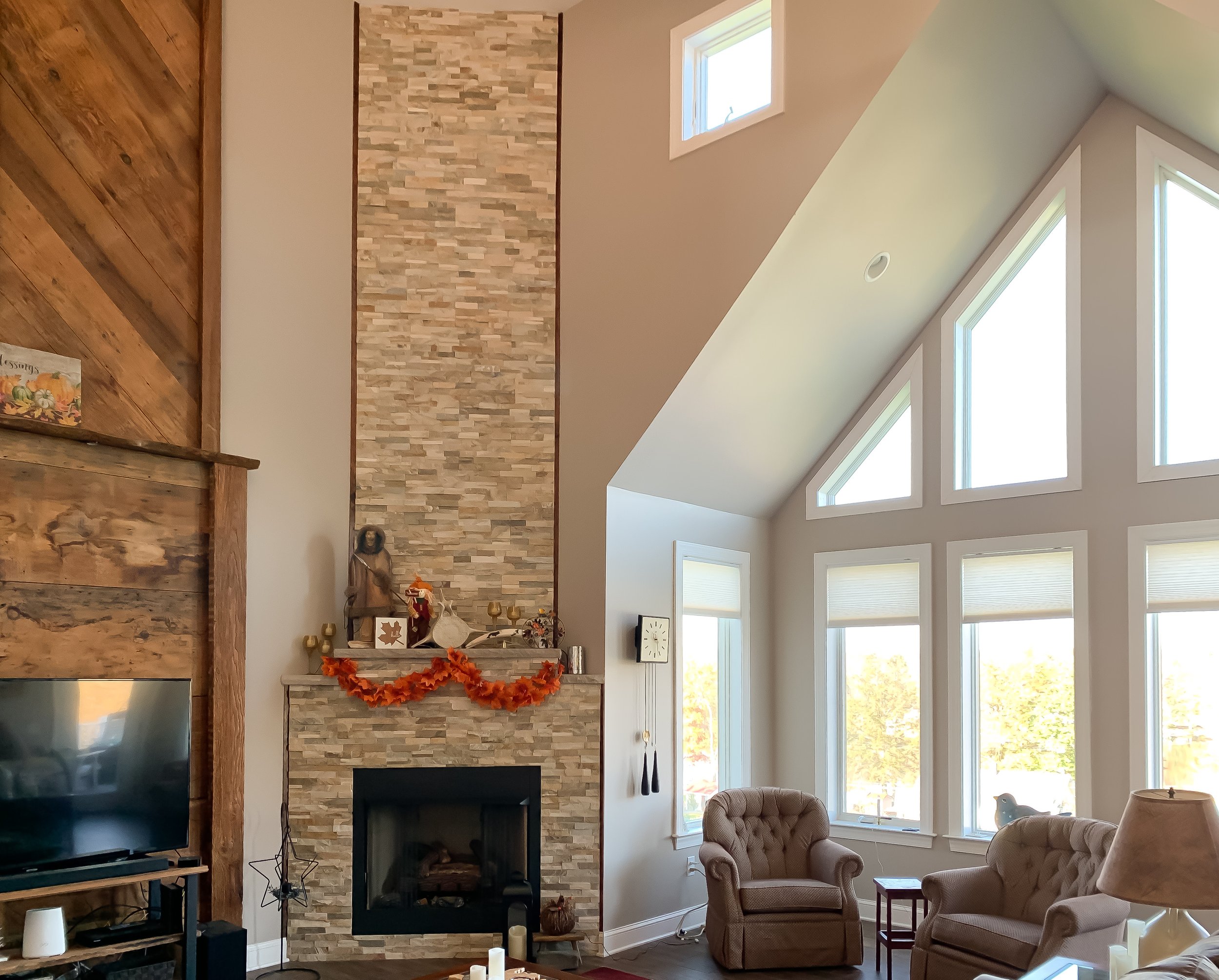 Vaulted ceiling modular home with fireplace living room.JPEG
