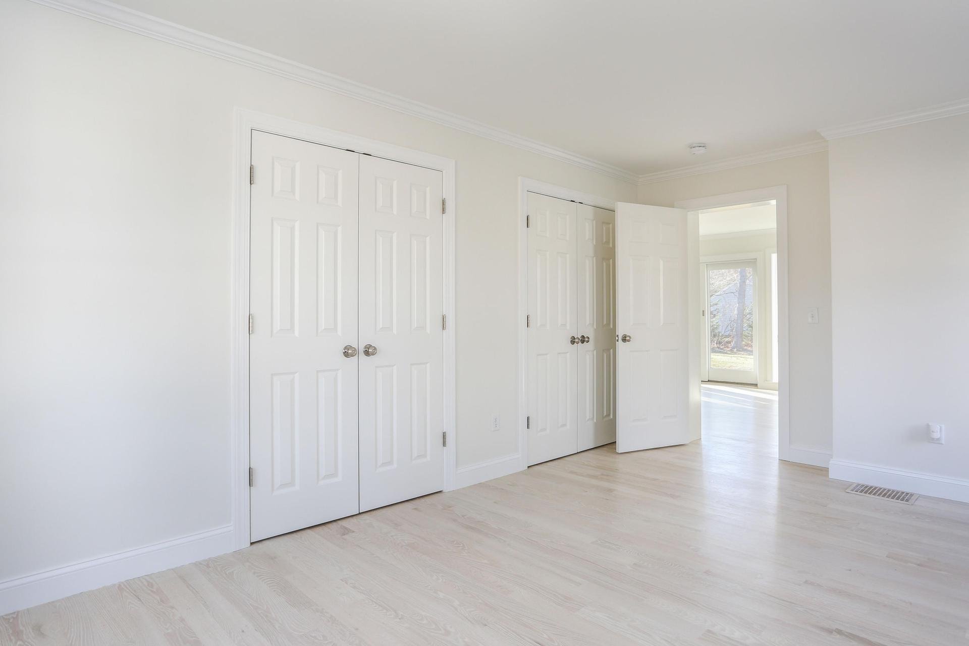 First floor master suite in modular cape home.jpeg