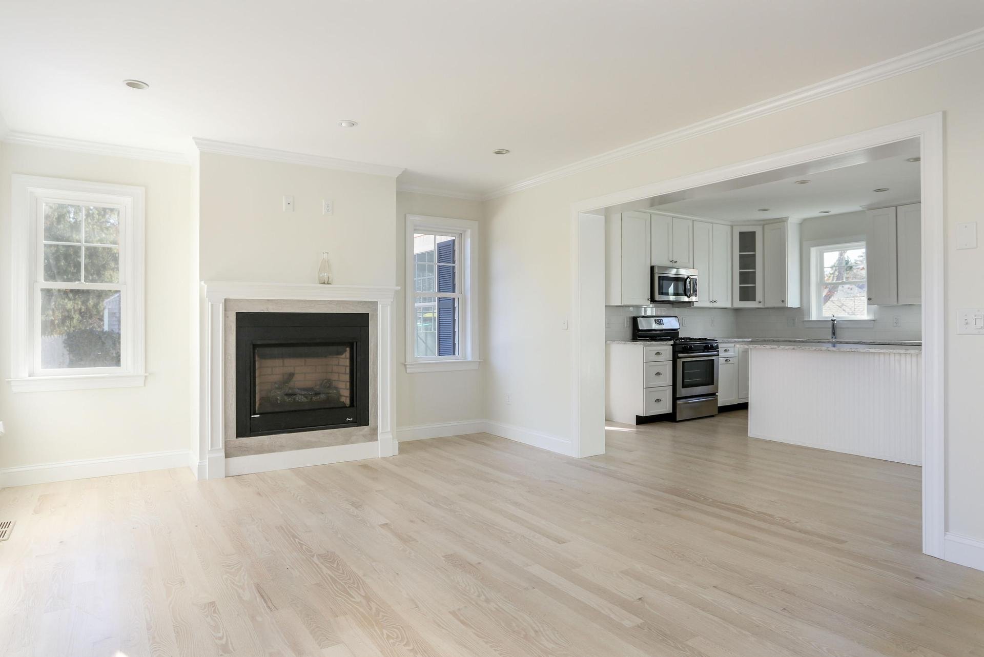 Gas fireplace in modular home with kitchen.jpeg