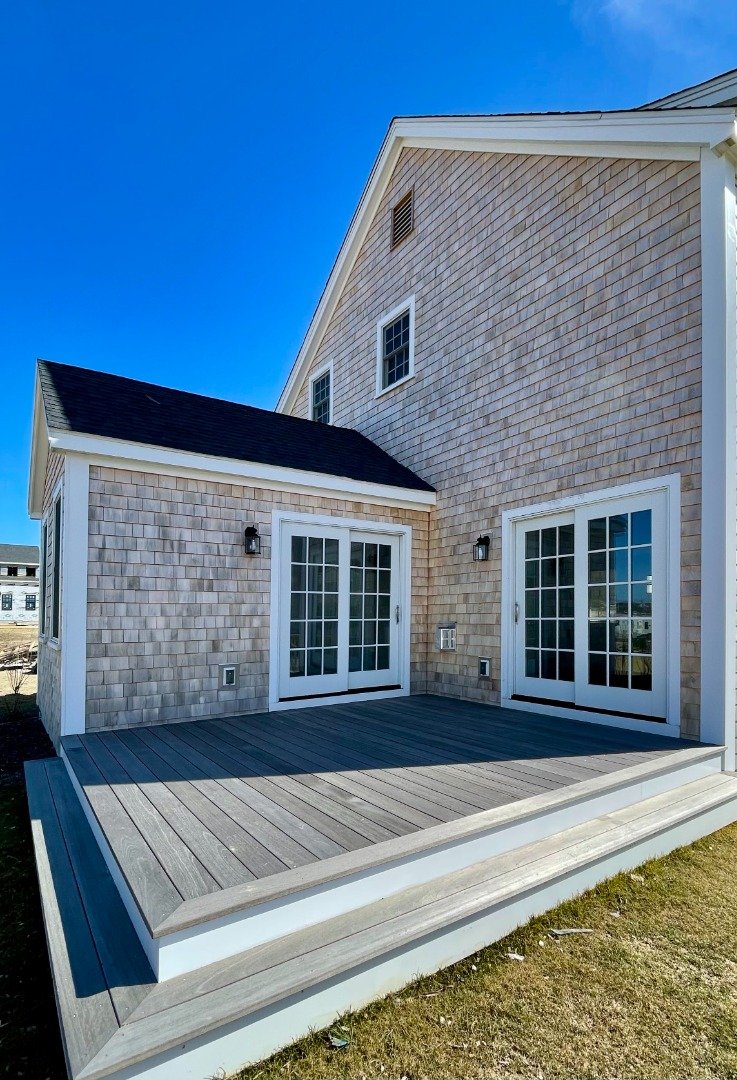 Back porch on modular home with cedar shake siding.jpeg